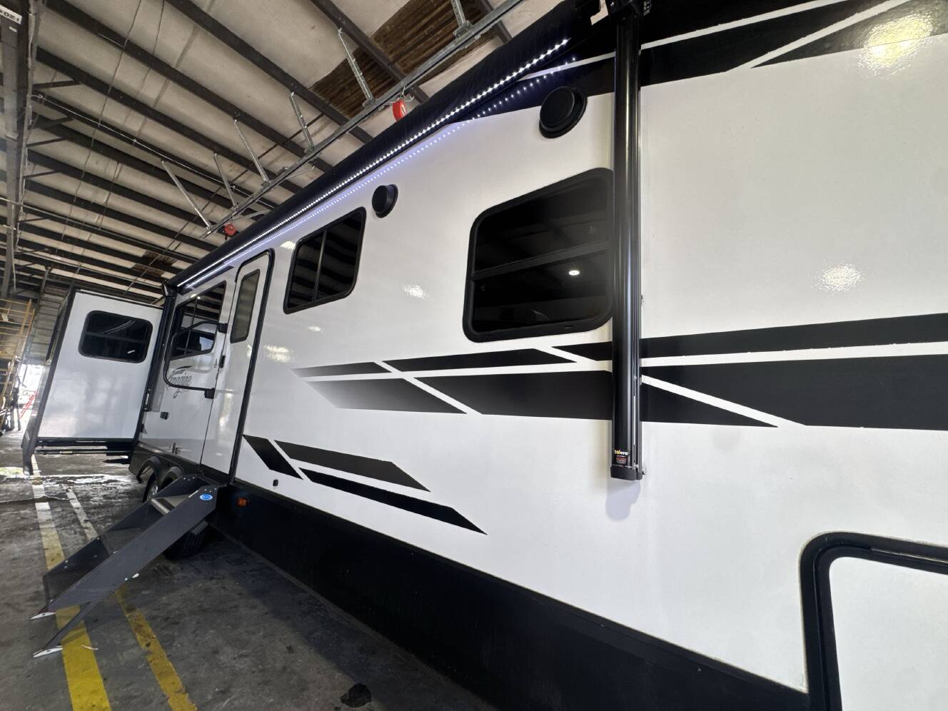 A photo of this 2022 Grand Design IMAGINE 3100RD