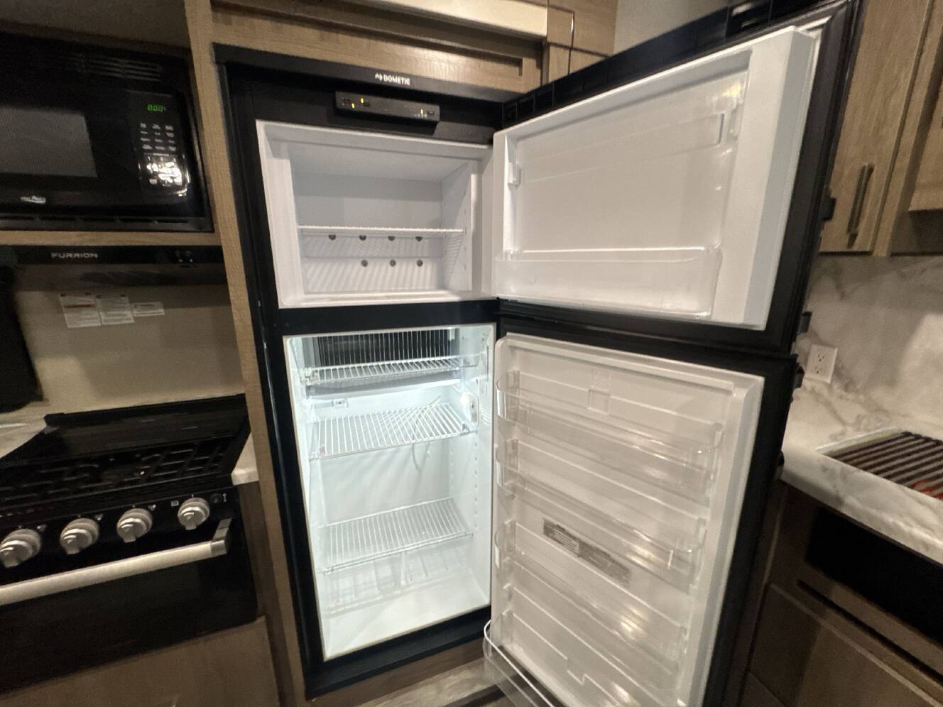 A photo of this 2022 Grand Design IMAGINE 3100RD