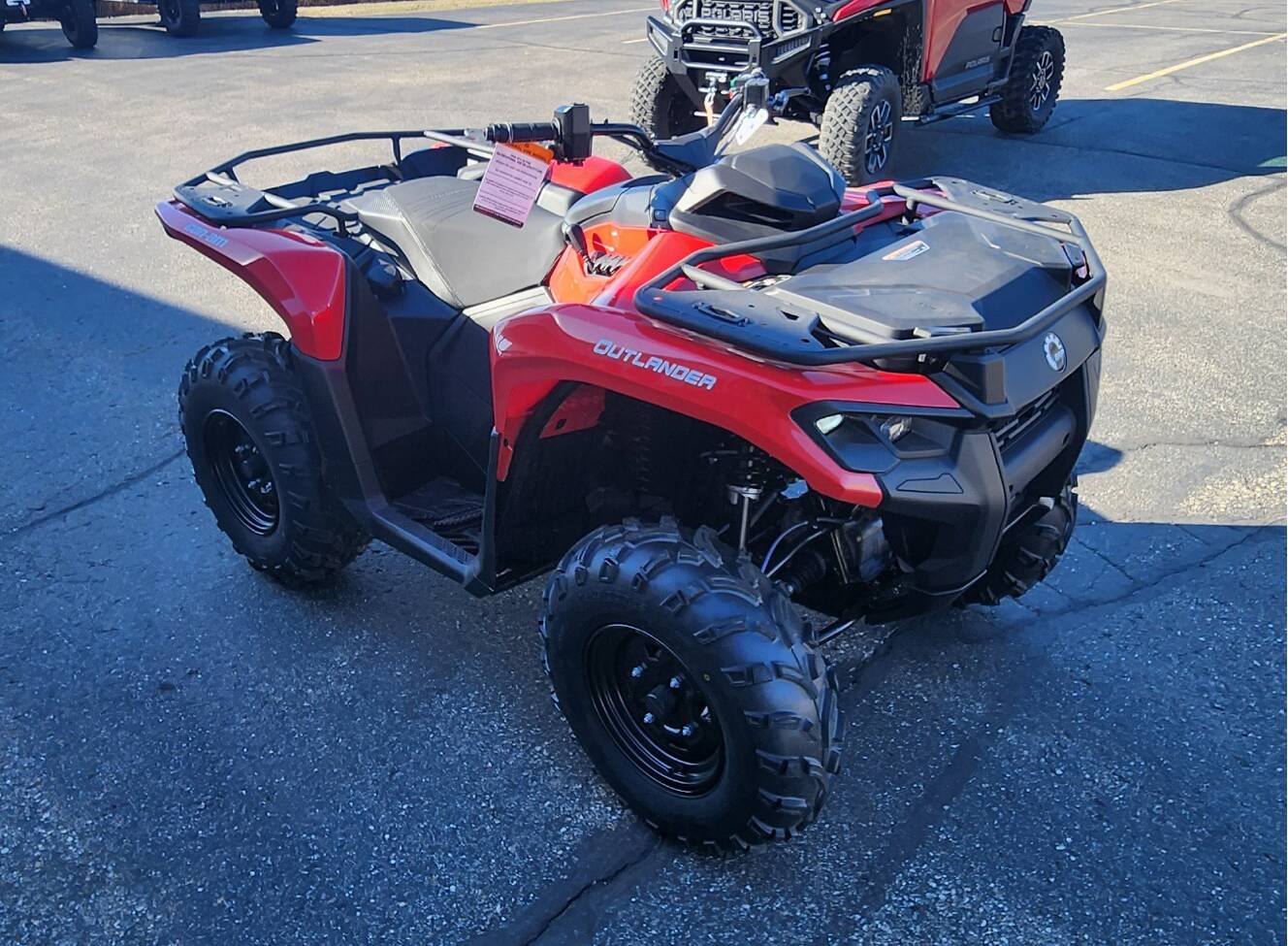 A photo of this 2026 Can-Am Outlander DPS 700 Red