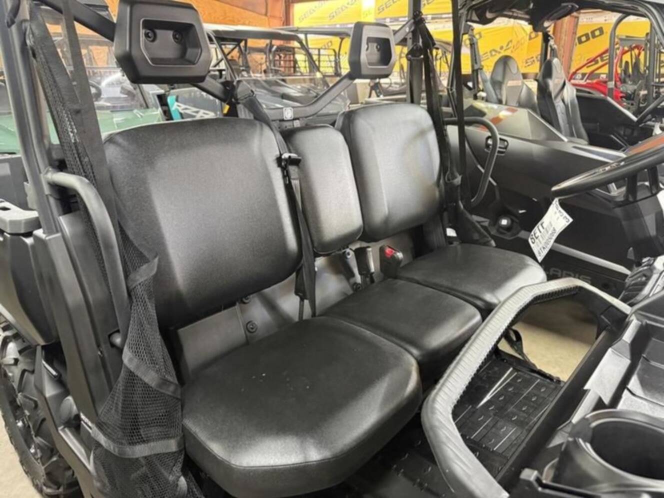 A photo of this 2026 Can-Am Defender DPS HD9 Dark Wildland Camo