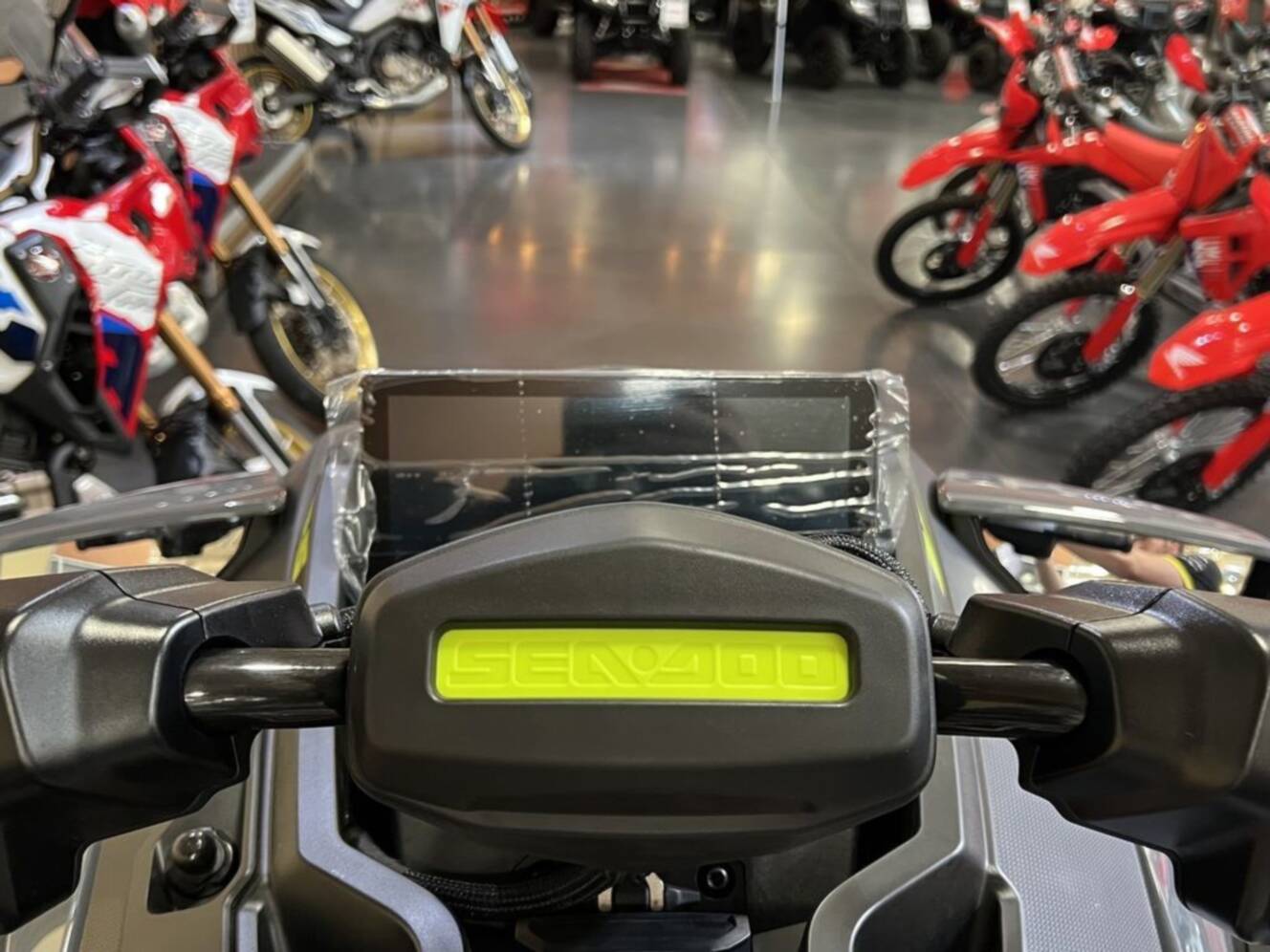 A photo of this 2026 Sea-Doo RXT-X 325 Ice Metal Manta Green