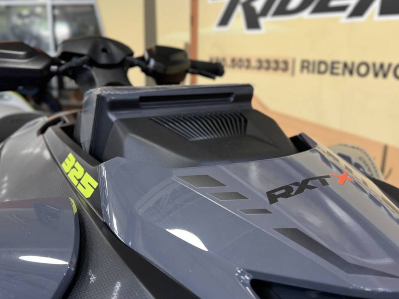 A photo of this 2026 Sea-Doo RXT-X 325 Ice Metal Manta Green
