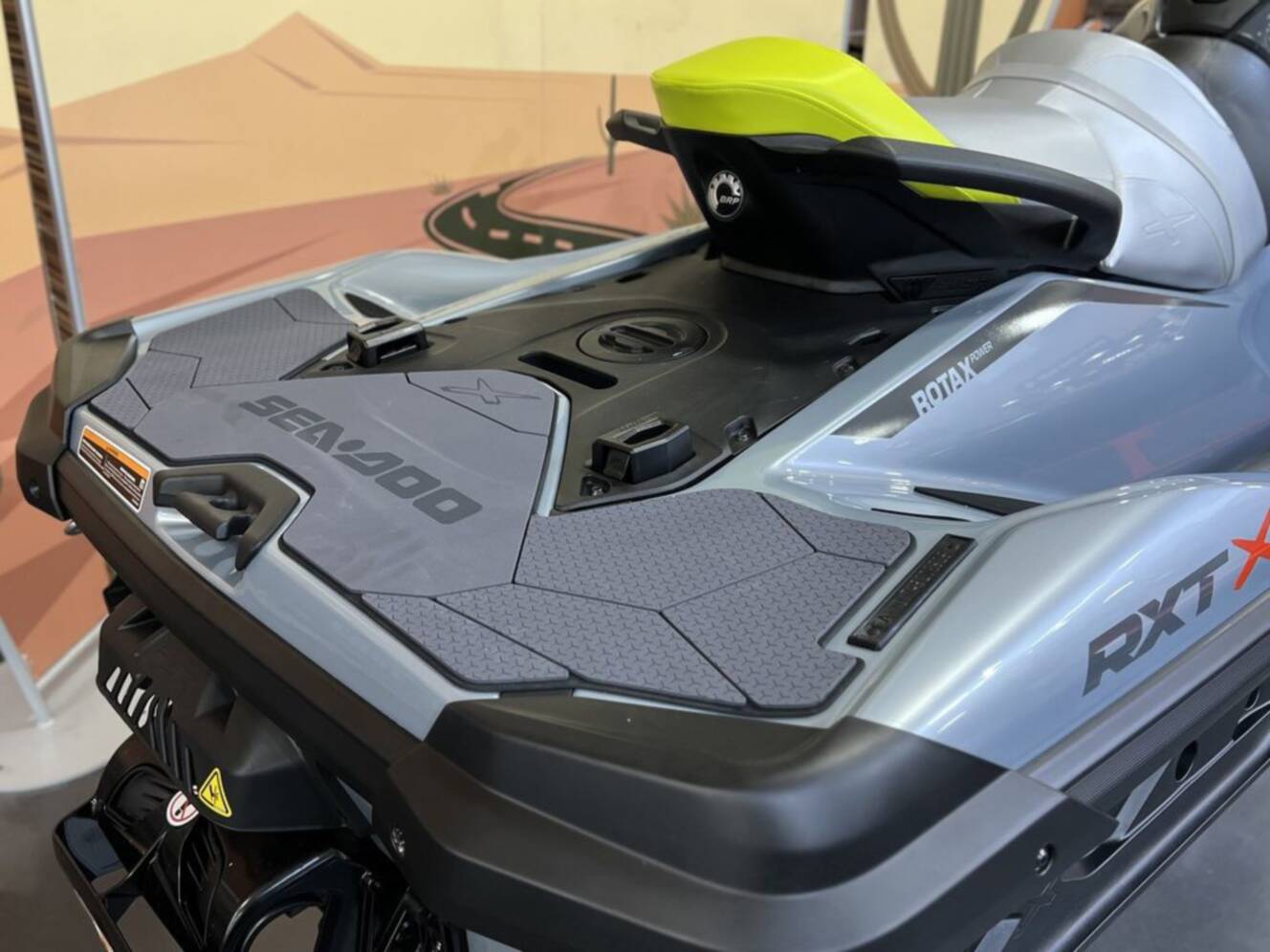 A photo of this 2026 Sea-Doo RXT-X 325 Ice Metal Manta Green
