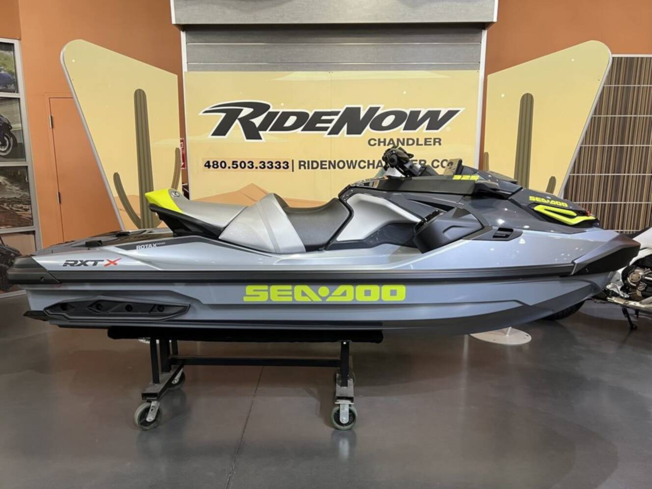 A photo of this 2026 Sea-Doo RXT-X 325 Ice Metal Manta Green