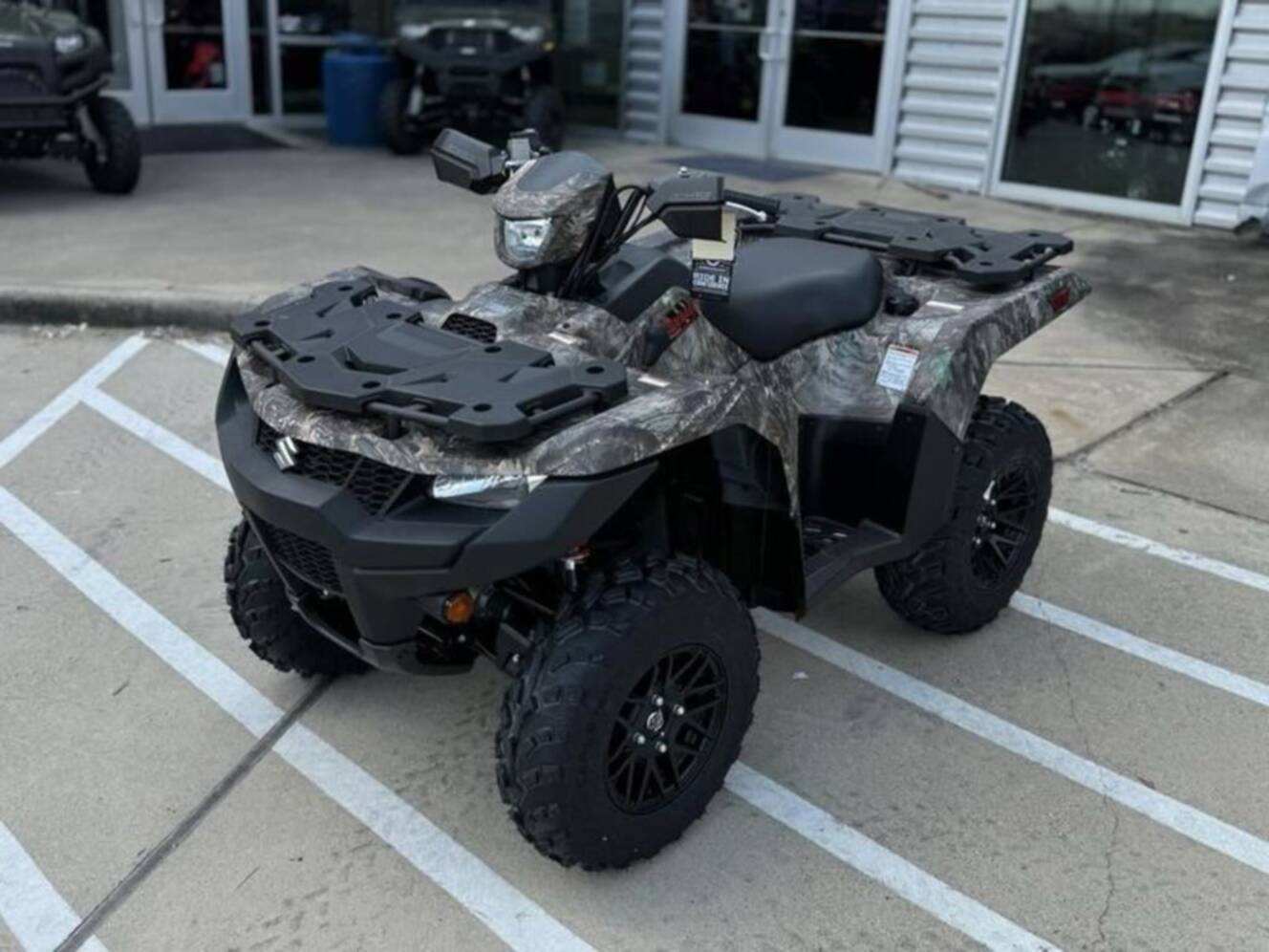 A photo of this 2025 Suzuki KingQuad 500 AXi Power Steering SE Camo