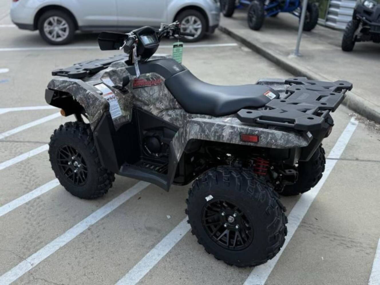 A photo of this 2025 Suzuki KingQuad 500 AXi Power Steering SE Camo