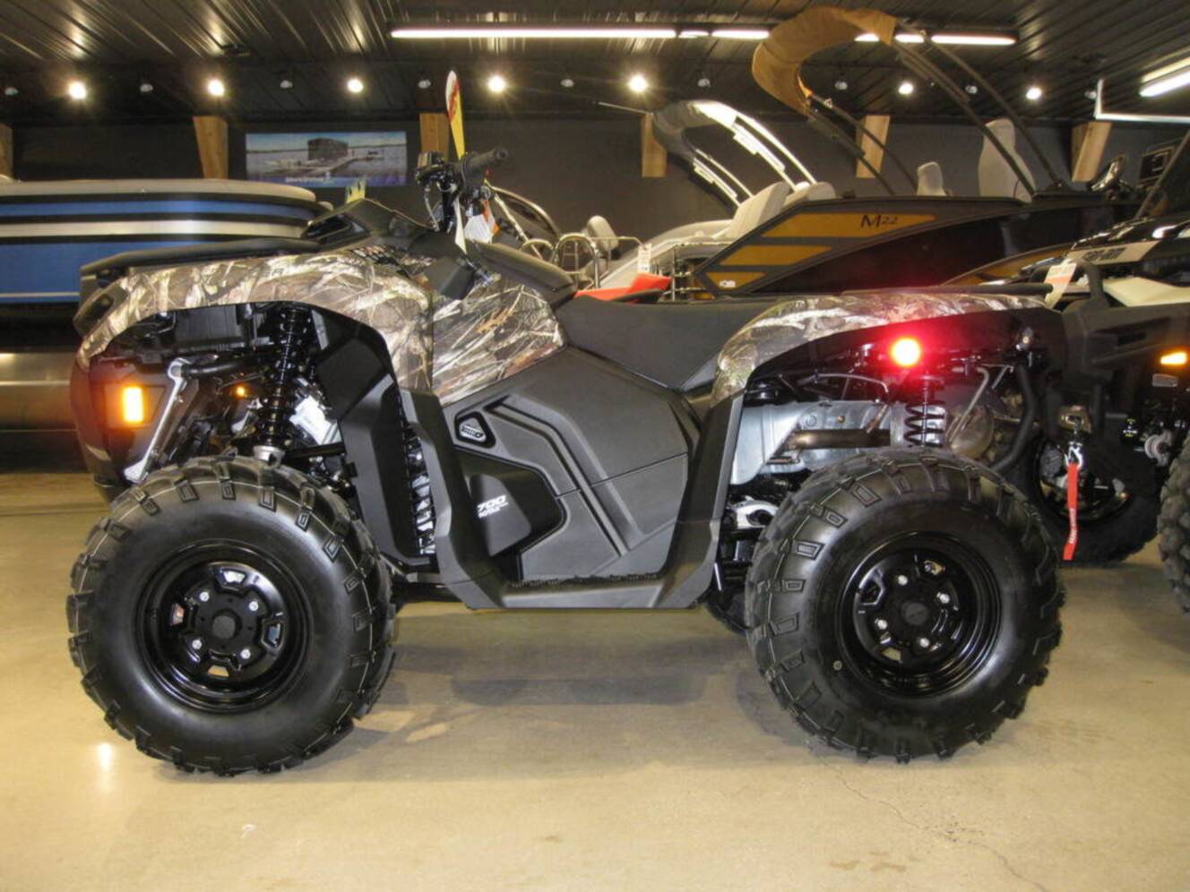 A photo of this 2026 Can-Am Outlander DPS 700 Wildland Camo