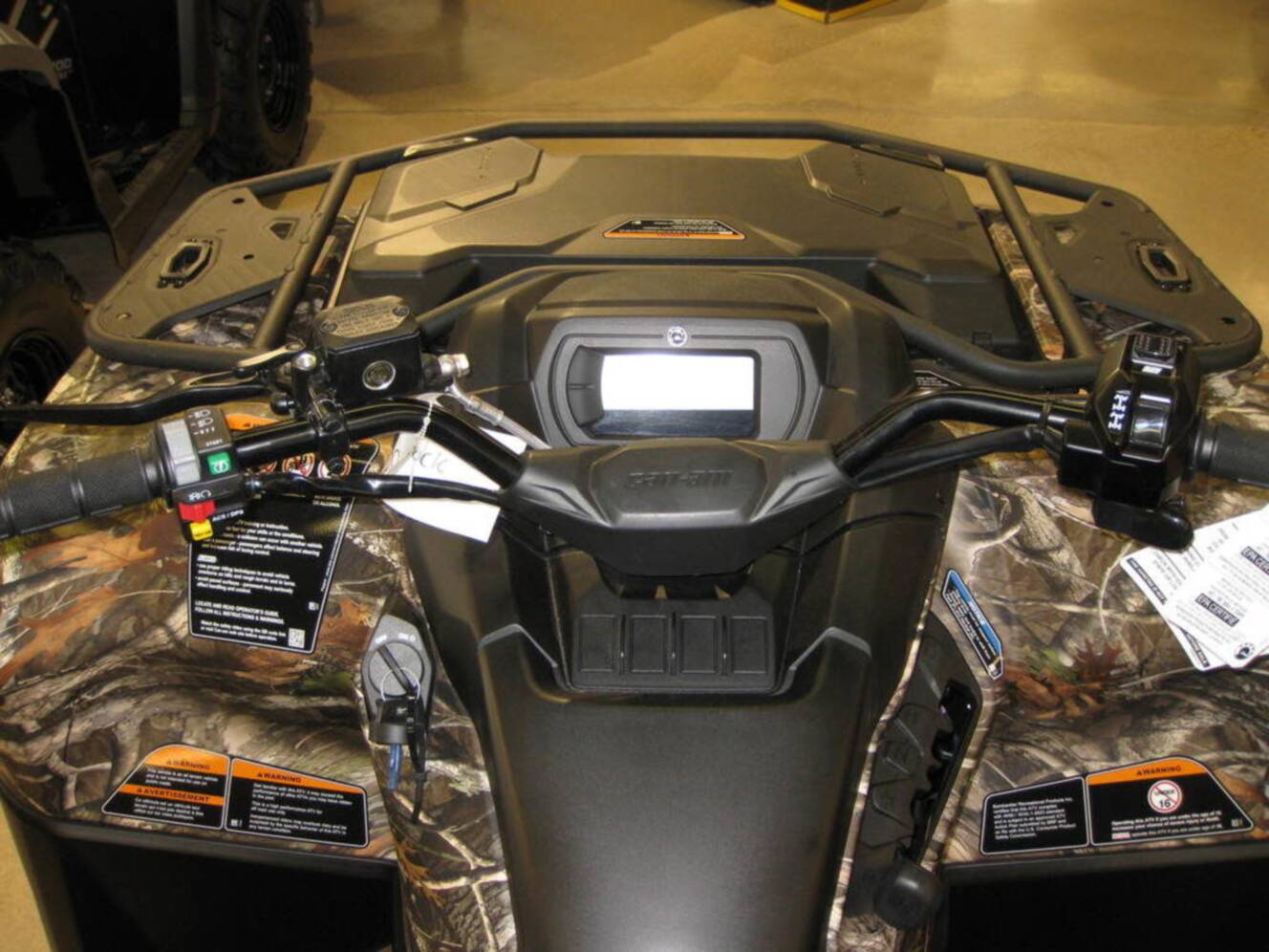 A photo of this 2026 Can-Am Outlander DPS 700 Wildland Camo