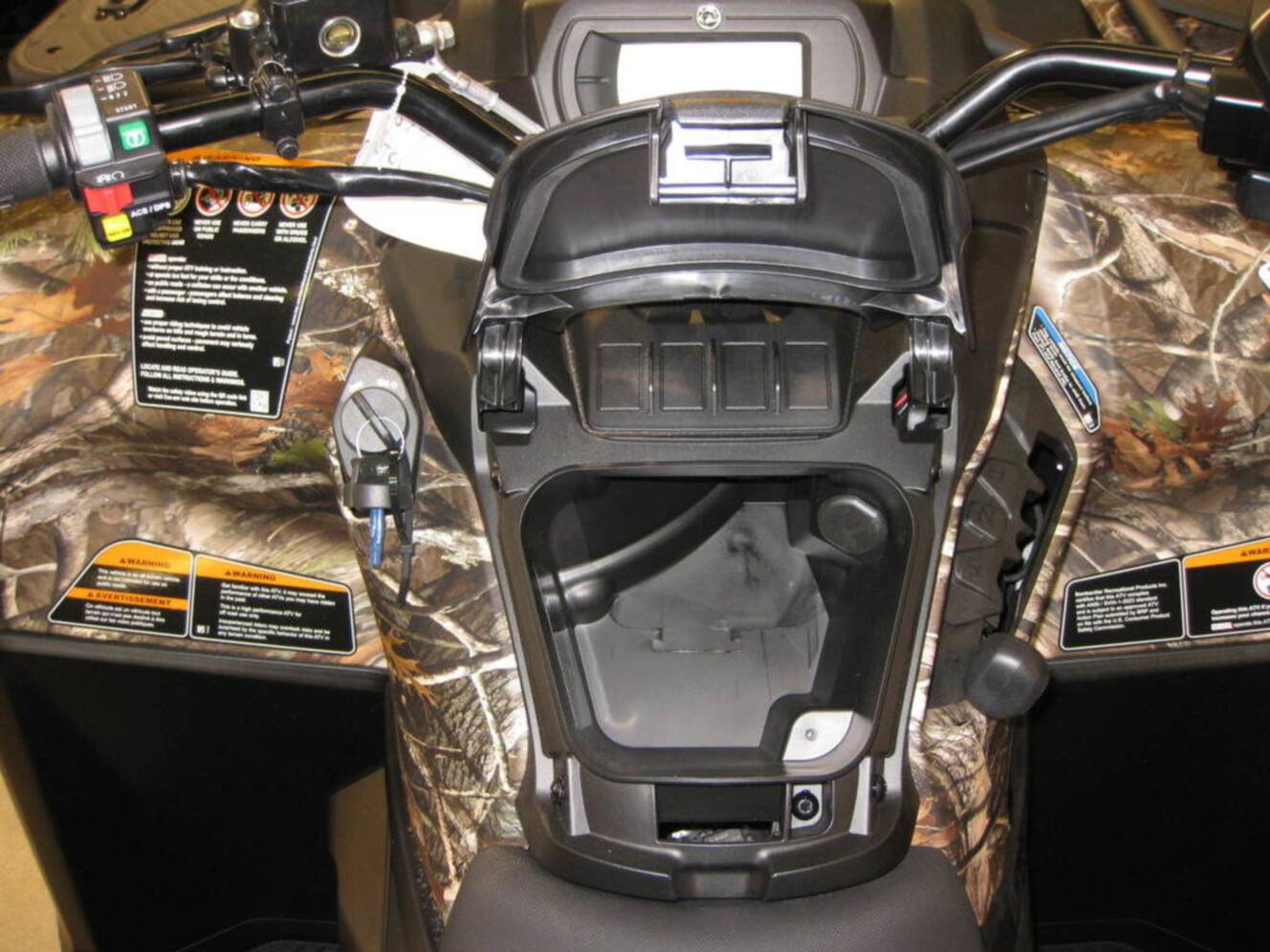 A photo of this 2026 Can-Am Outlander DPS 700 Wildland Camo