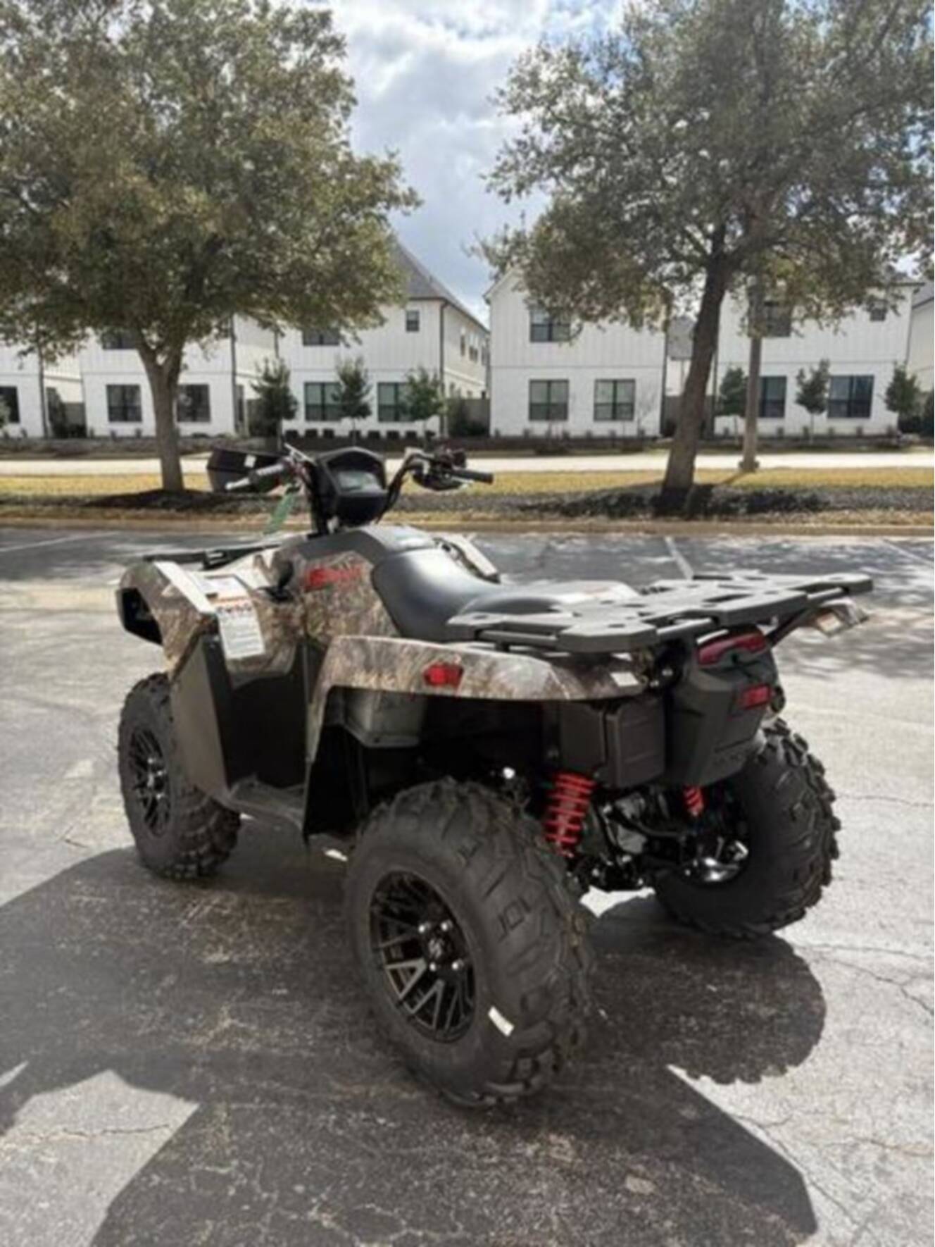 A photo of this 2025 Suzuki KingQuad 500AXi Power Steering SE Camo