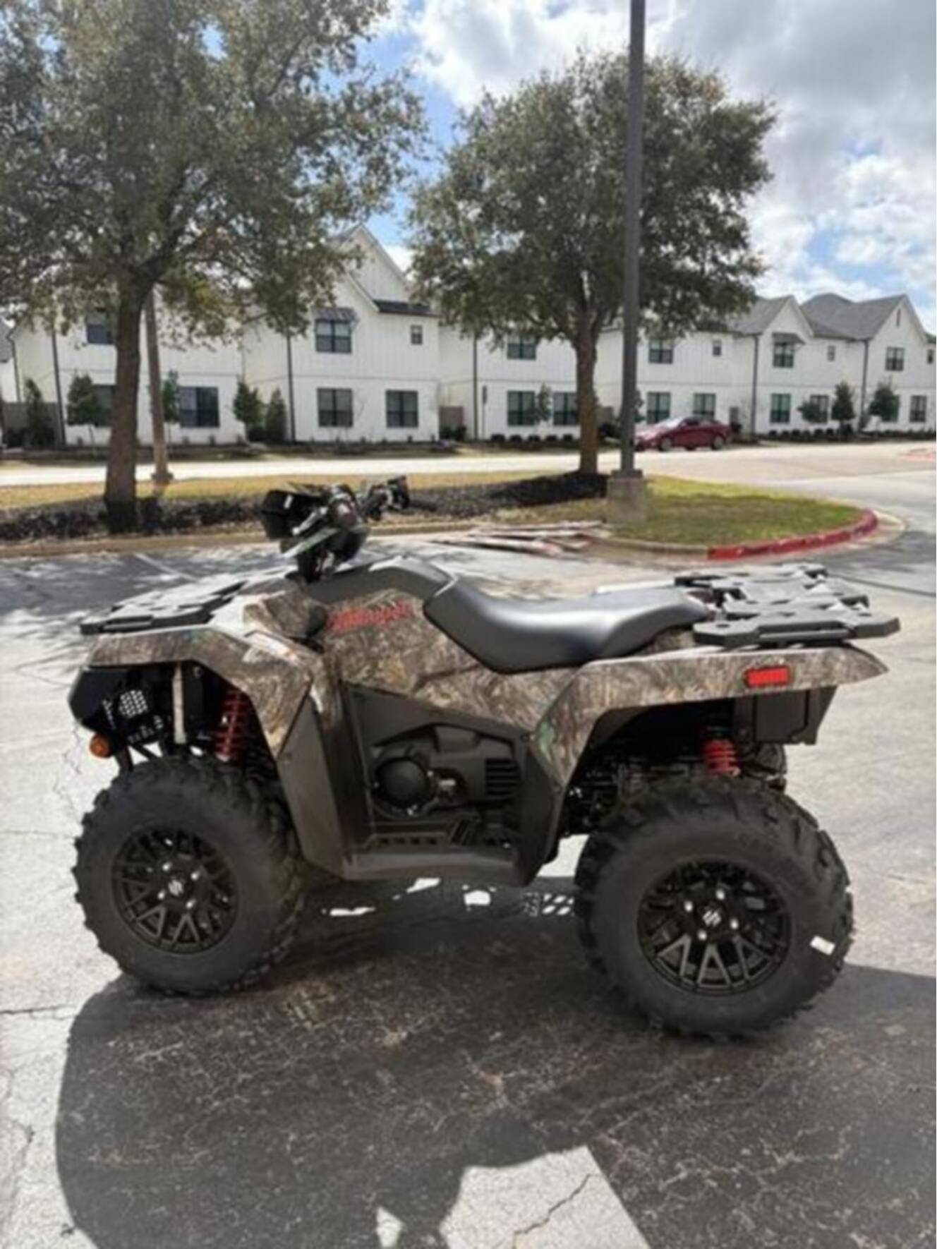 A photo of this 2025 Suzuki KingQuad 500AXi Power Steering SE Camo