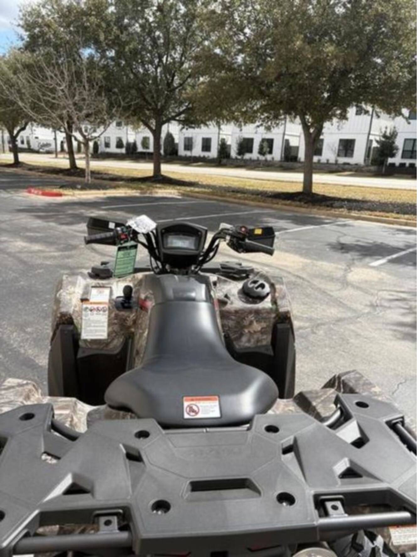 A photo of this 2025 Suzuki KingQuad 500AXi Power Steering SE Camo