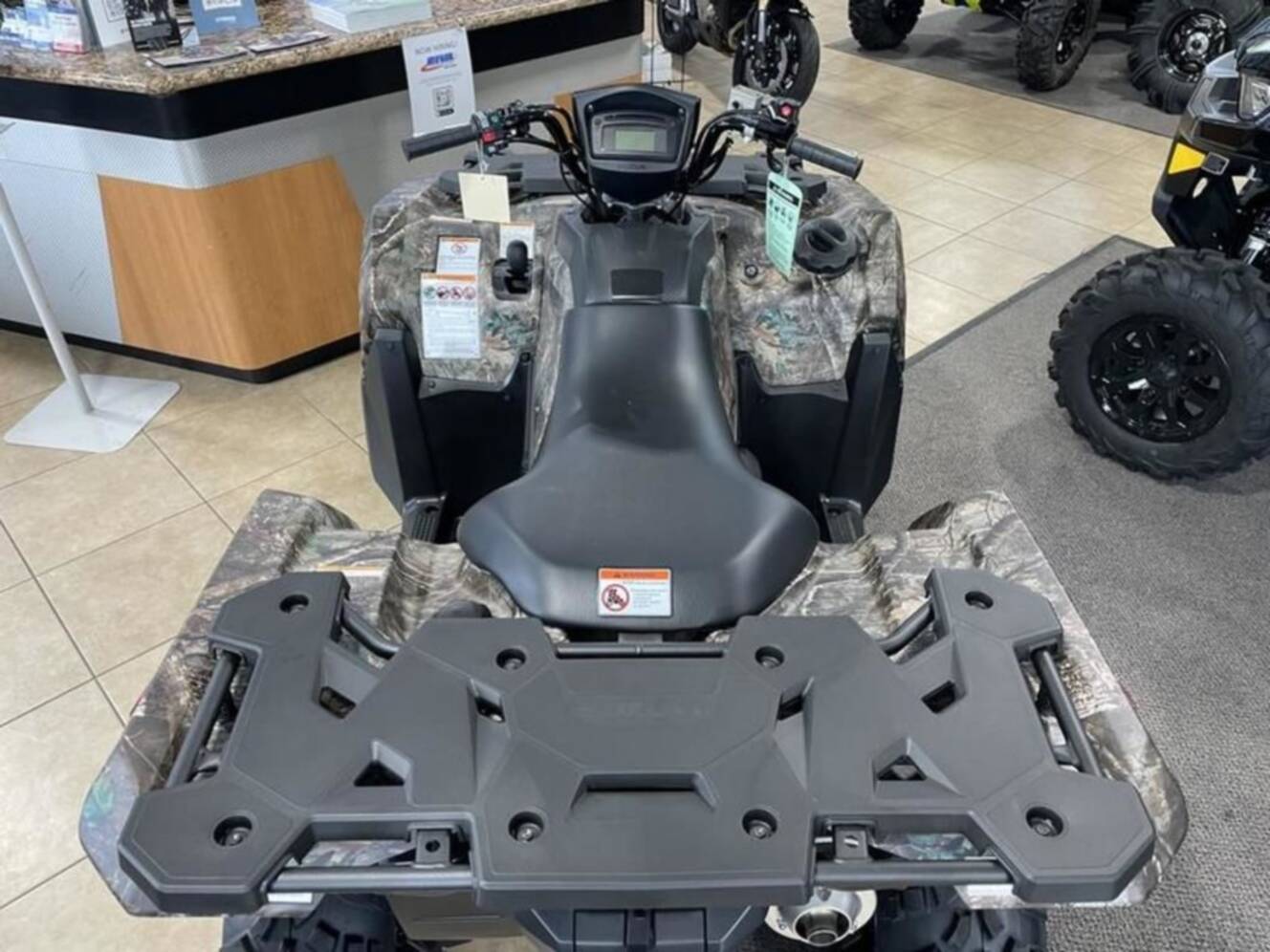 A photo of this 2025 Suzuki KingQuad 500AXi Power Steering SE Camo