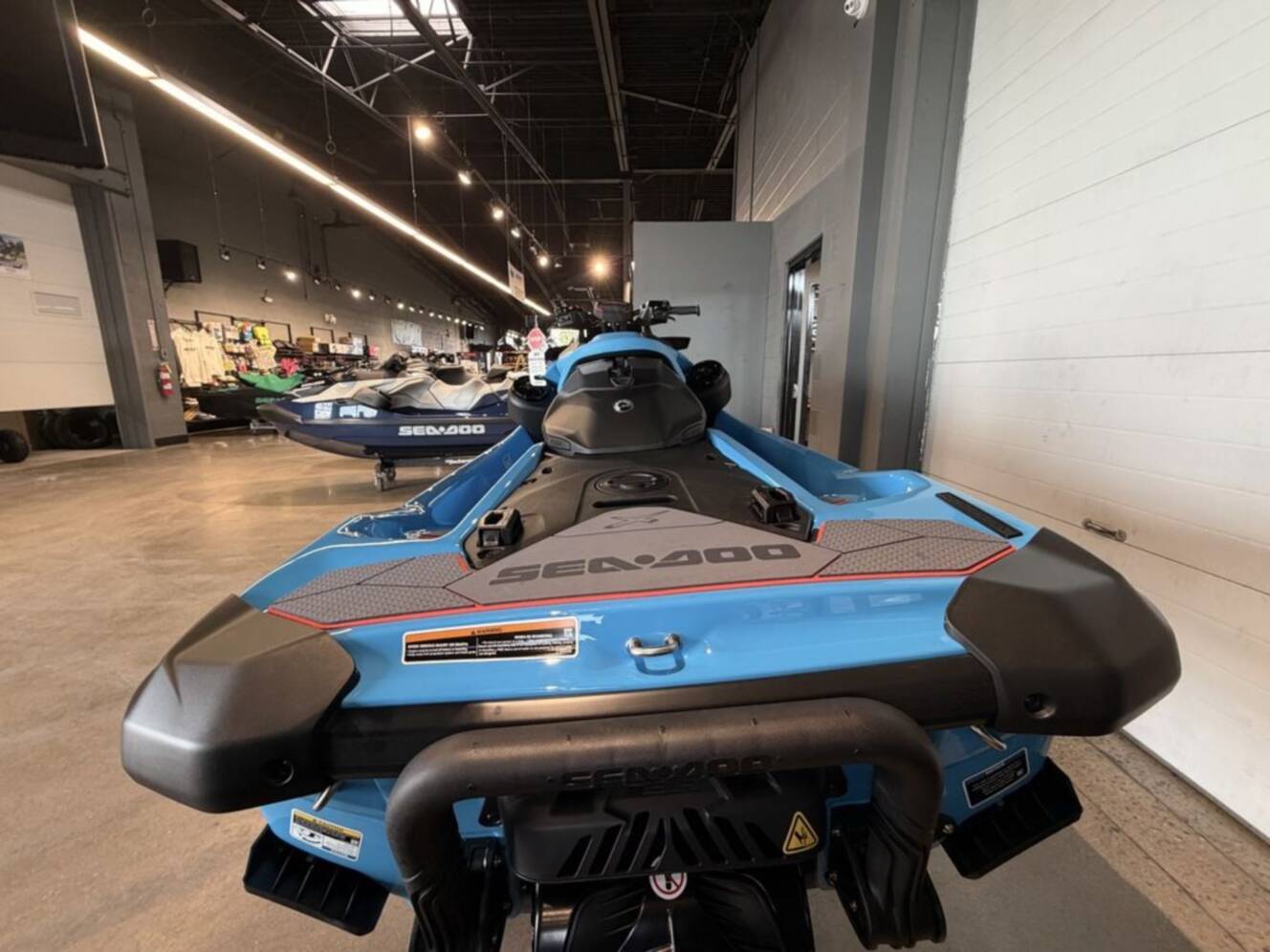 A photo of this 2026 Sea-Doo RXP-X 325 Tech, BRP Premium A, iBR Gulfstream Blue P