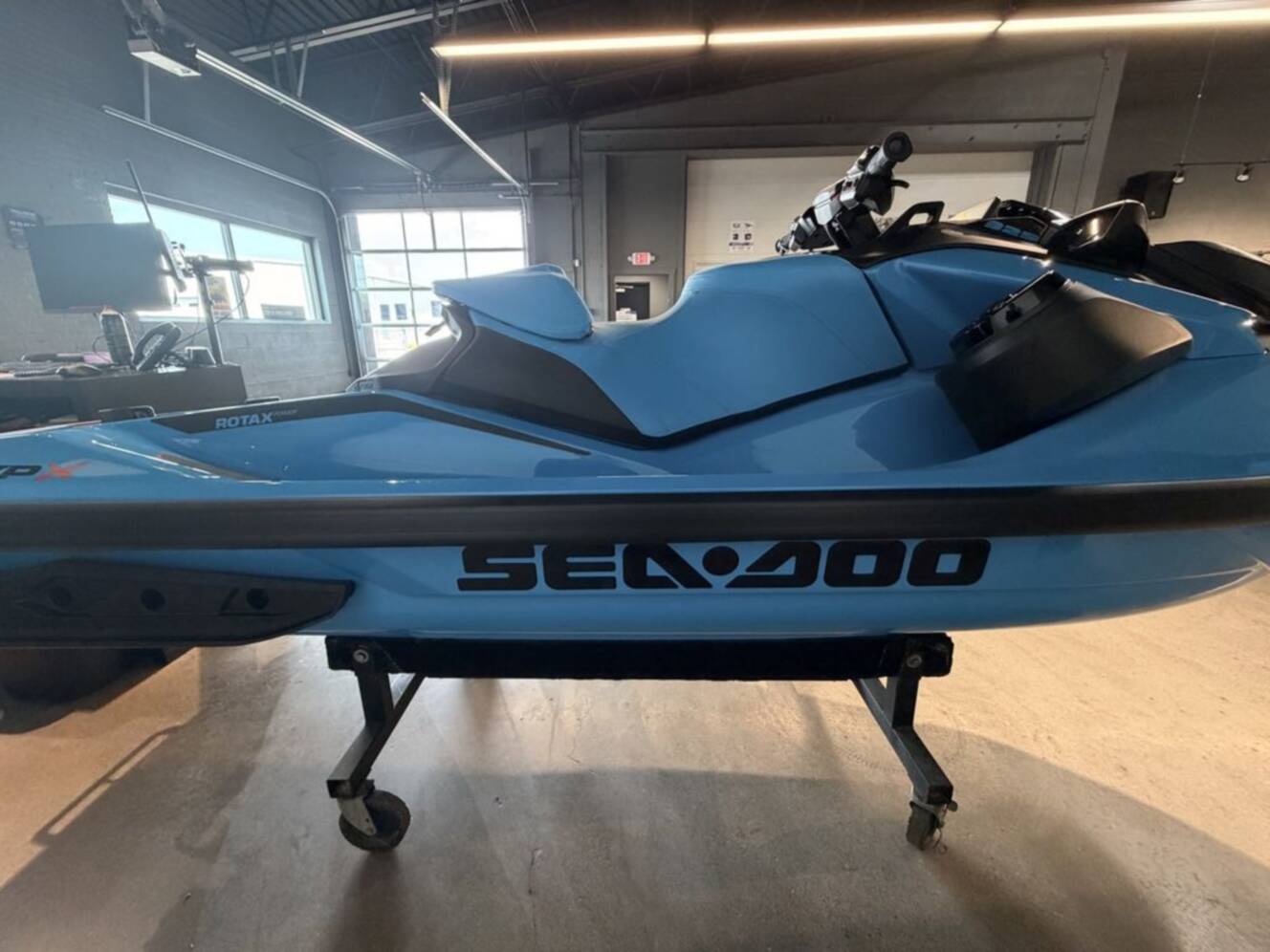 A photo of this 2026 Sea-Doo RXP-X 325 Tech, BRP Premium A, iBR Gulfstream Blue P