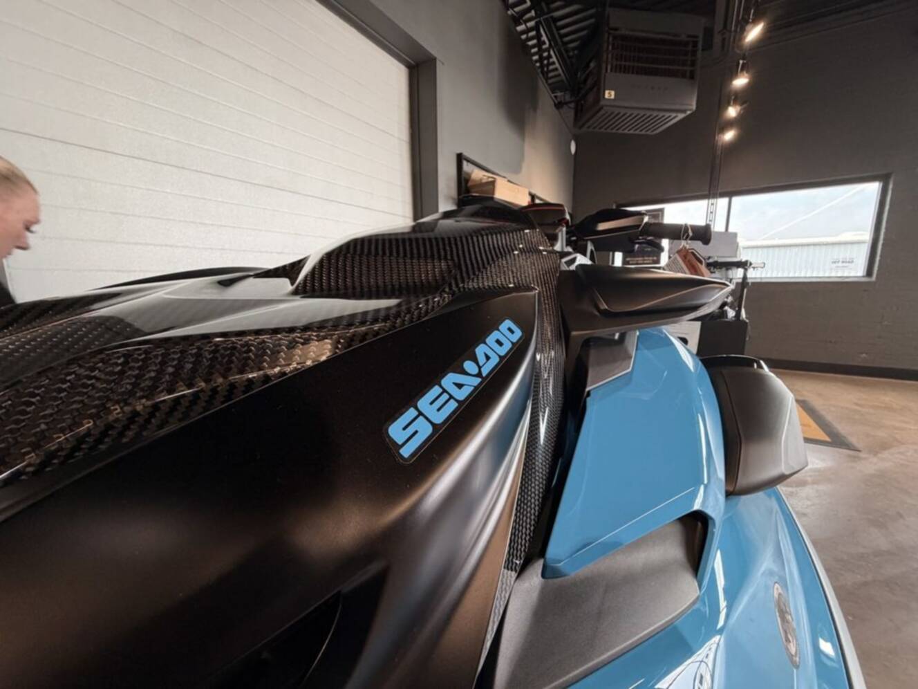 A photo of this 2026 Sea-Doo RXP-X 325 Tech, BRP Premium A, iBR Gulfstream Blue P