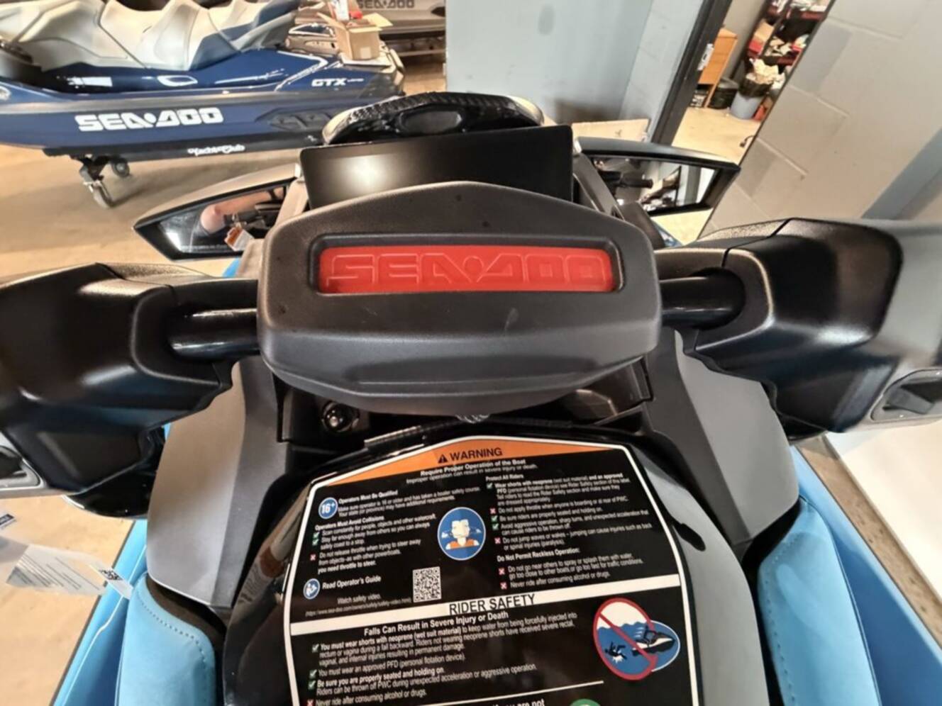 A photo of this 2026 Sea-Doo RXP-X 325 Tech, BRP Premium A, iBR Gulfstream Blue P