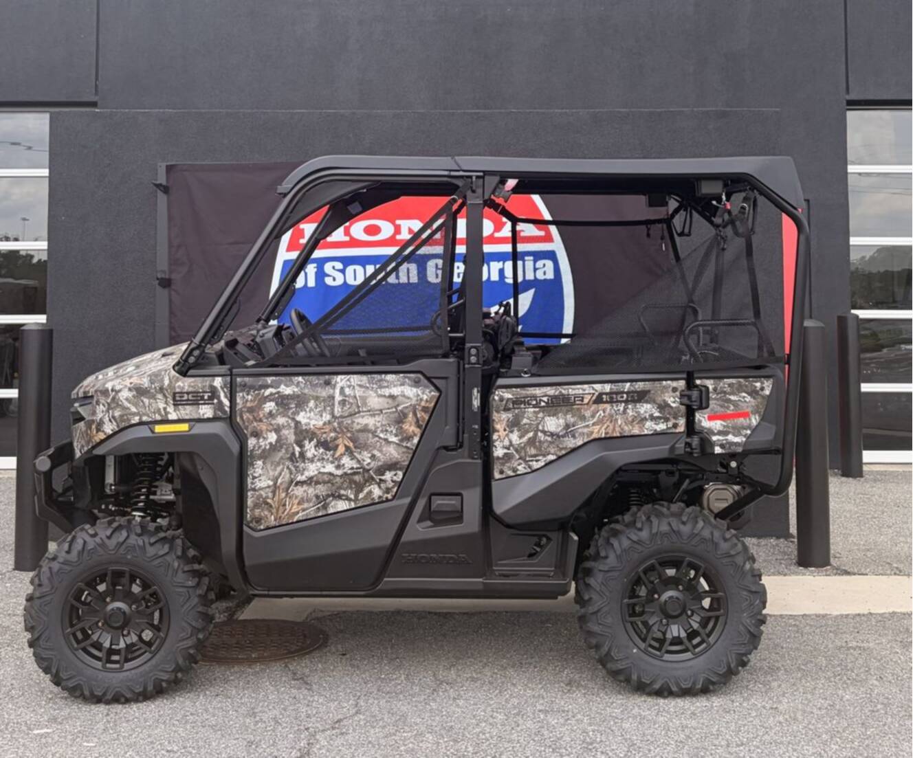 A photo of this 2026 Honda® Pioneer 1000-5 Deluxe TrueTimber Atera Camo
