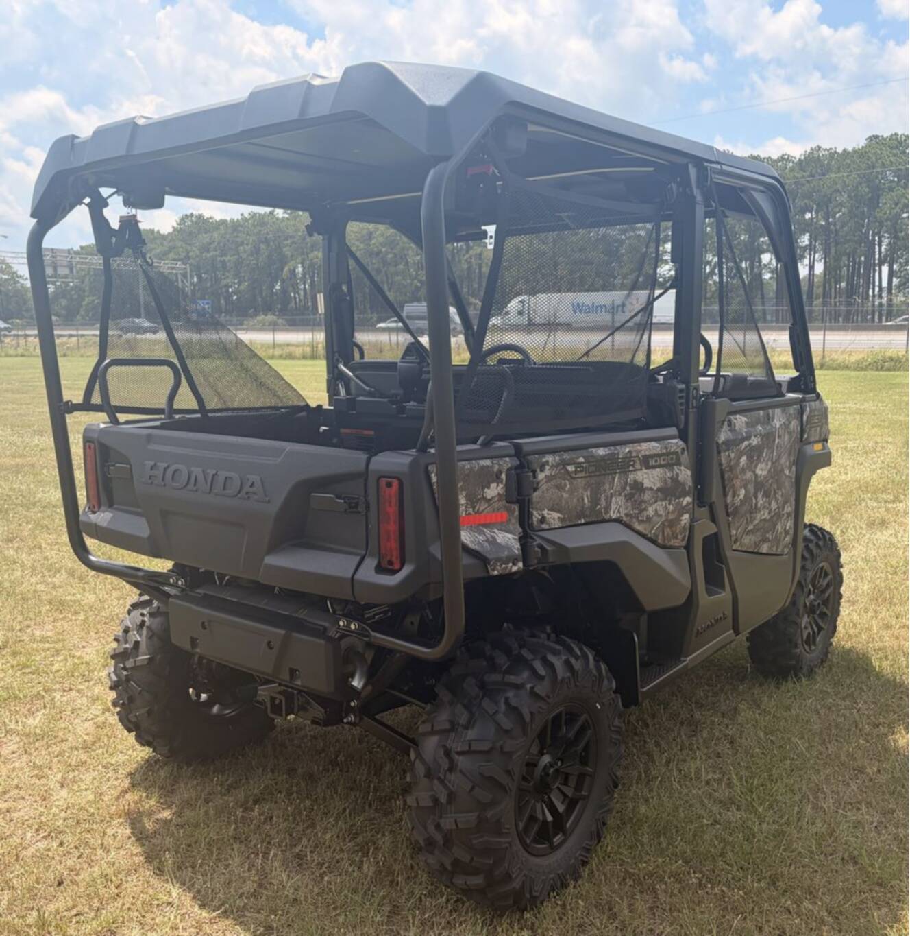 A photo of this 2026 Honda® Pioneer 1000-5 Deluxe TrueTimber Atera Camo