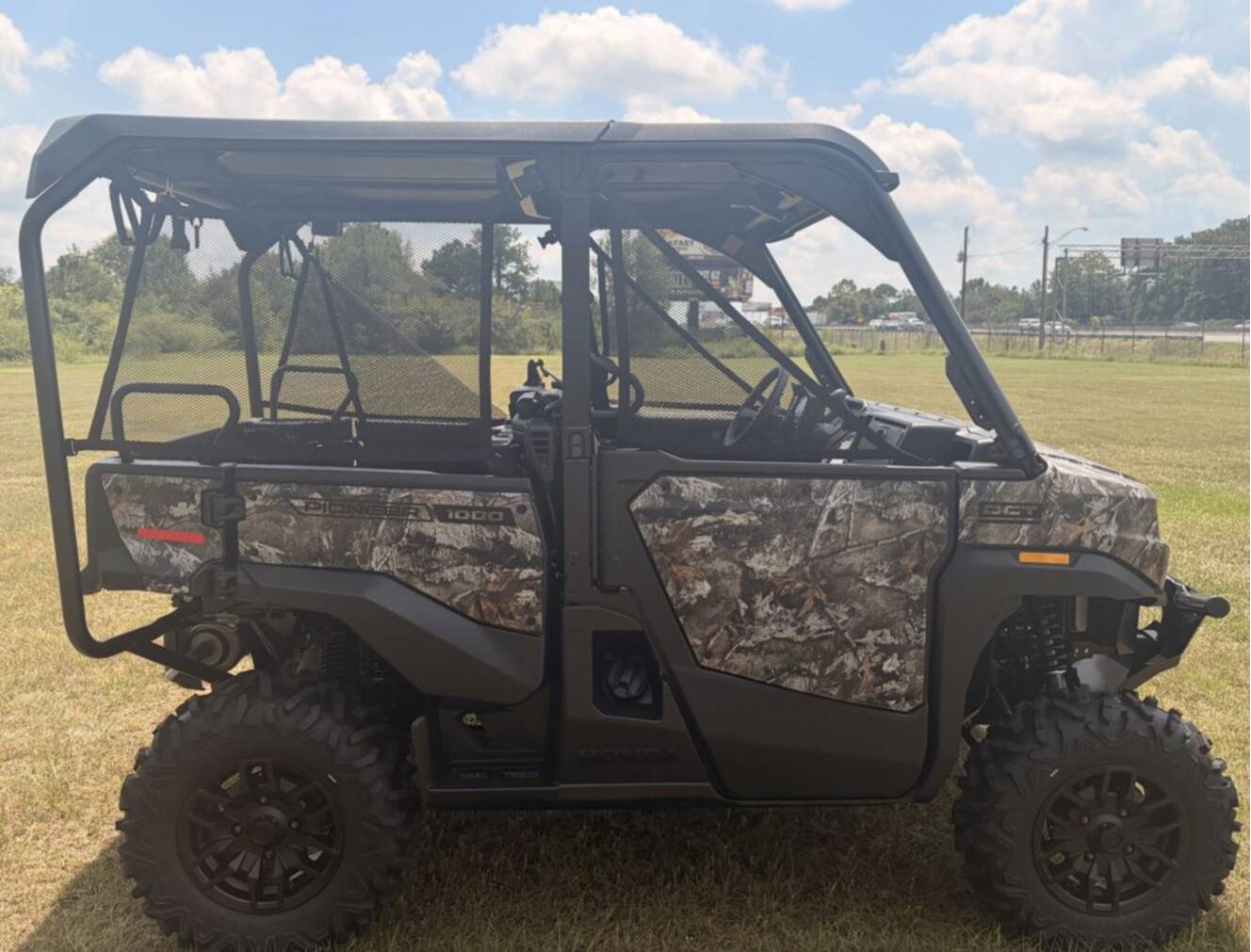 A photo of this 2026 Honda® Pioneer 1000-5 Deluxe TrueTimber Atera Camo