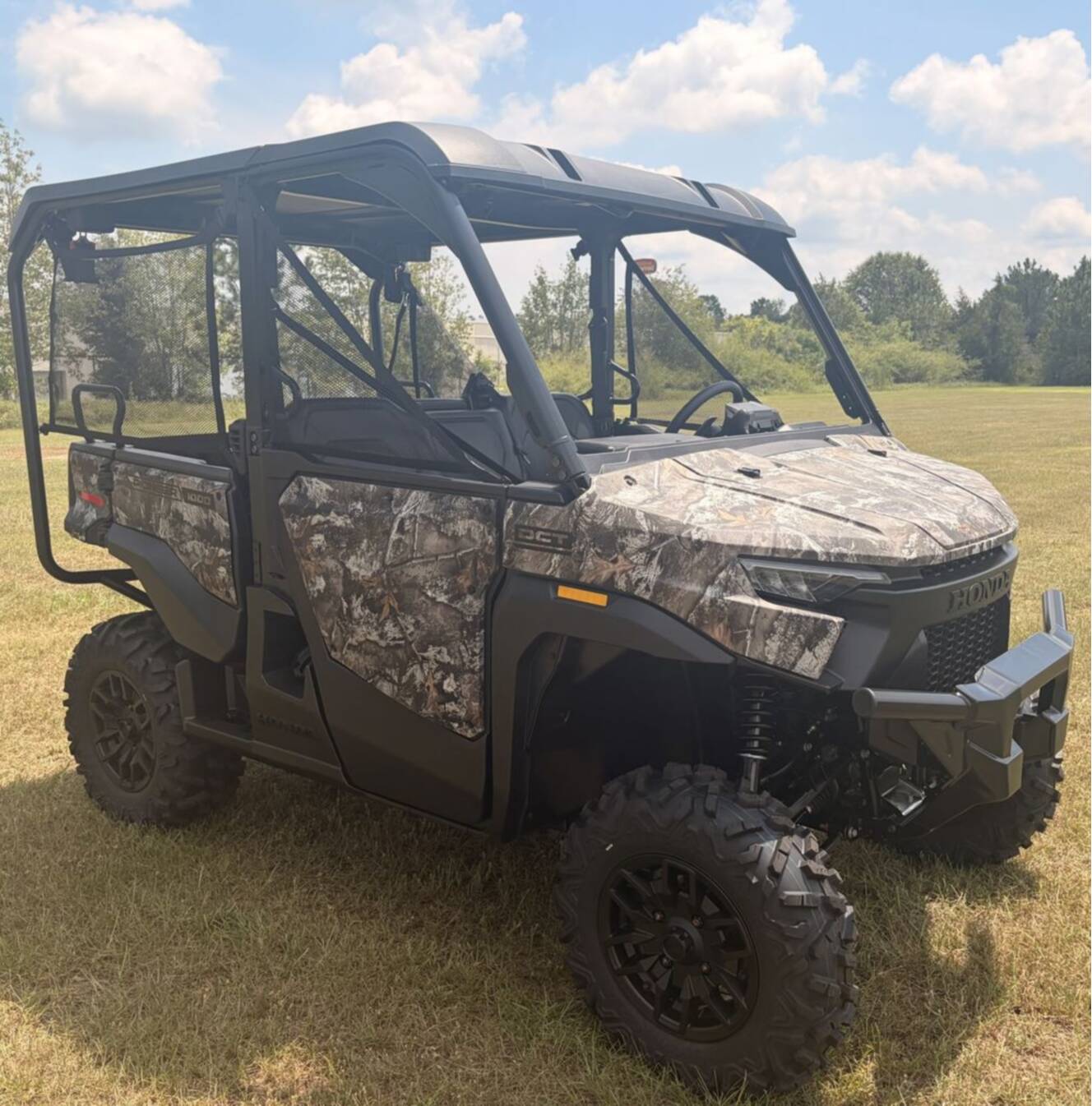 A photo of this 2026 Honda® Pioneer 1000-5 Deluxe TrueTimber Atera Camo