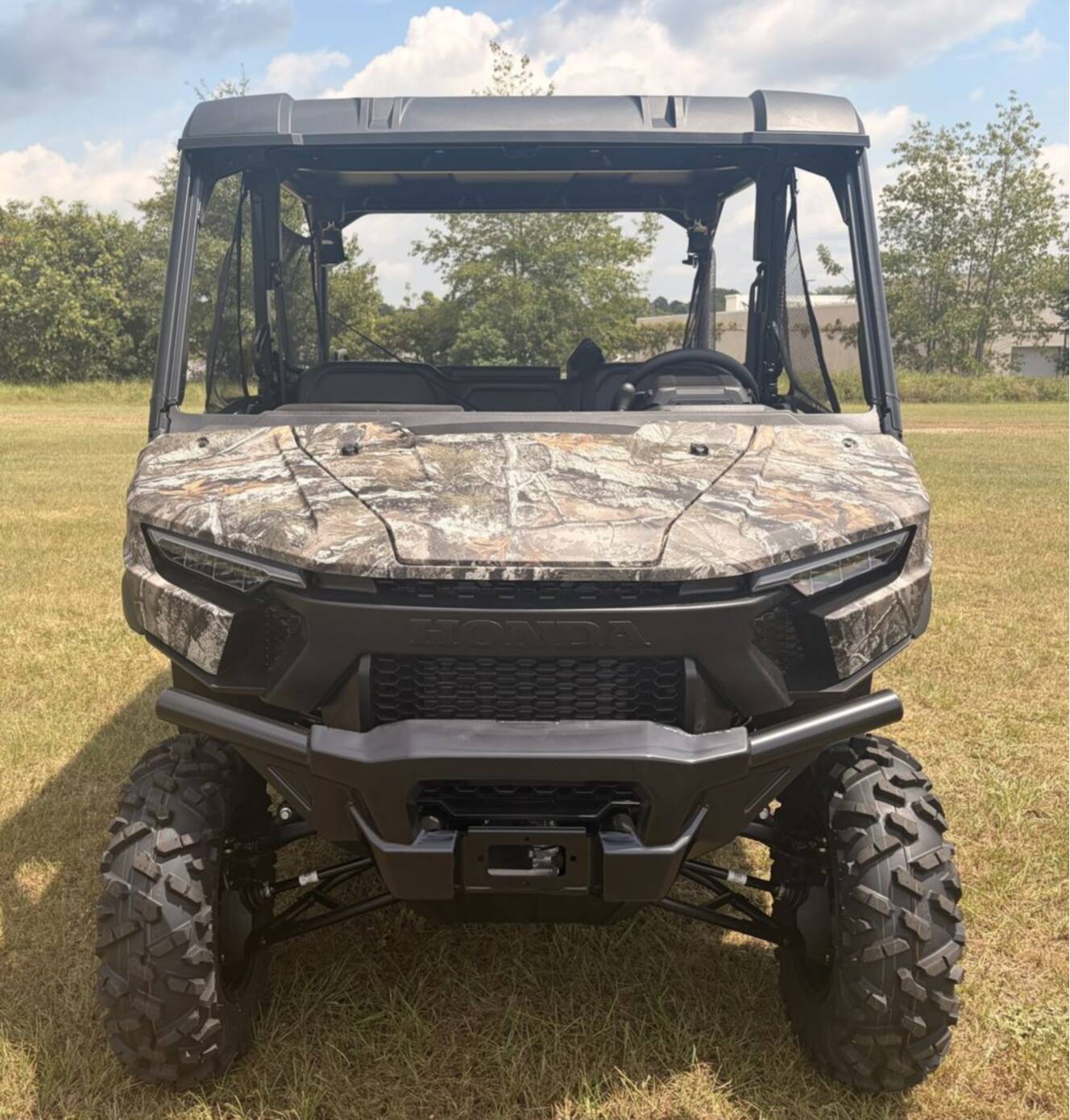 A photo of this 2026 Honda® Pioneer 1000-5 Deluxe TrueTimber Atera Camo
