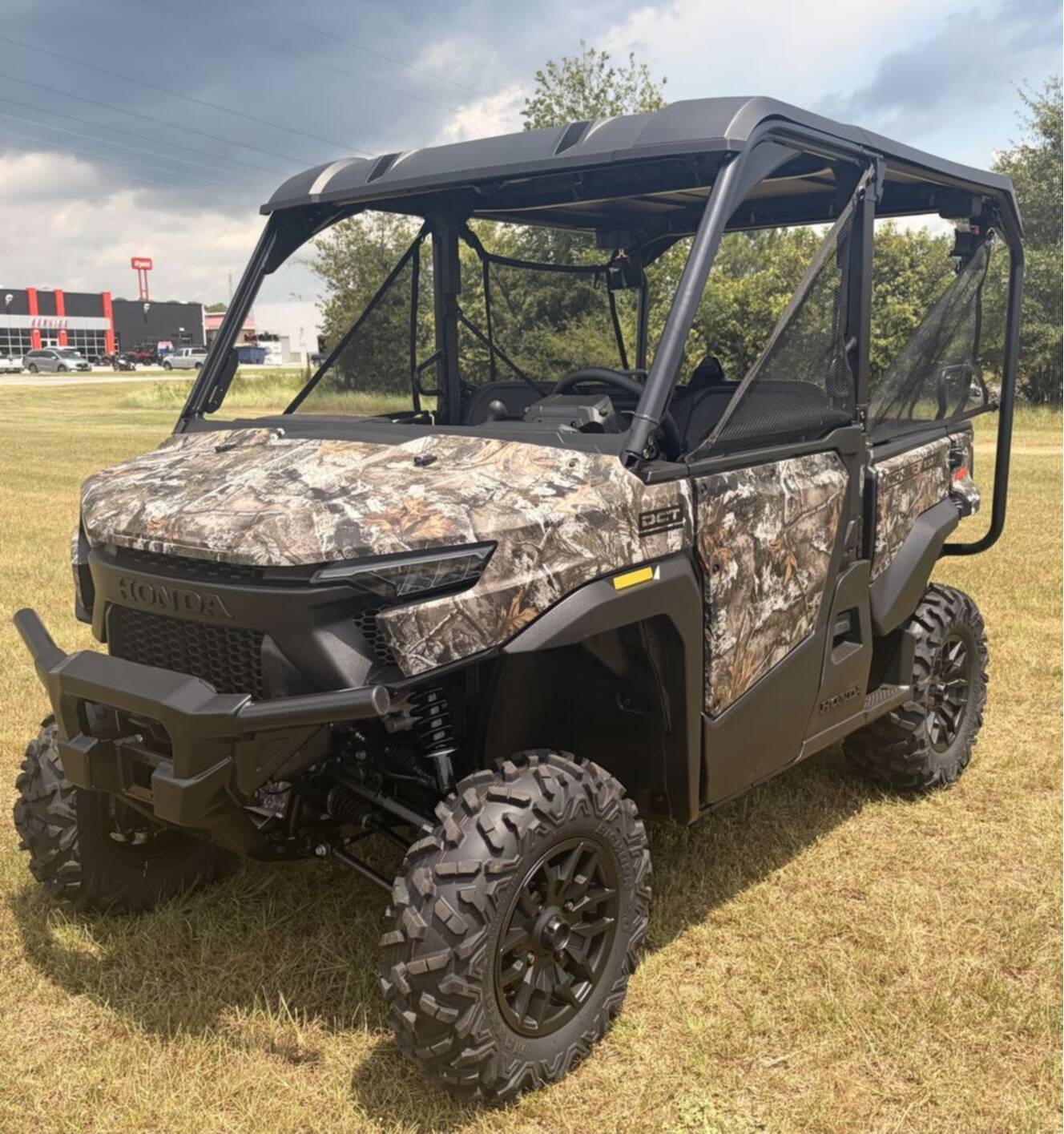 A photo of this 2026 Honda® Pioneer 1000-5 Deluxe TrueTimber Atera Camo