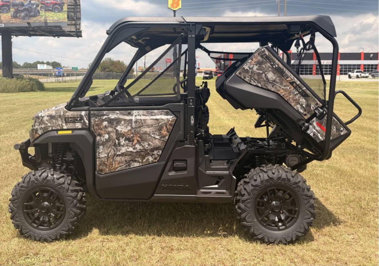A photo of this 2026 Honda® Pioneer 1000-5 Deluxe TrueTimber Atera Camo