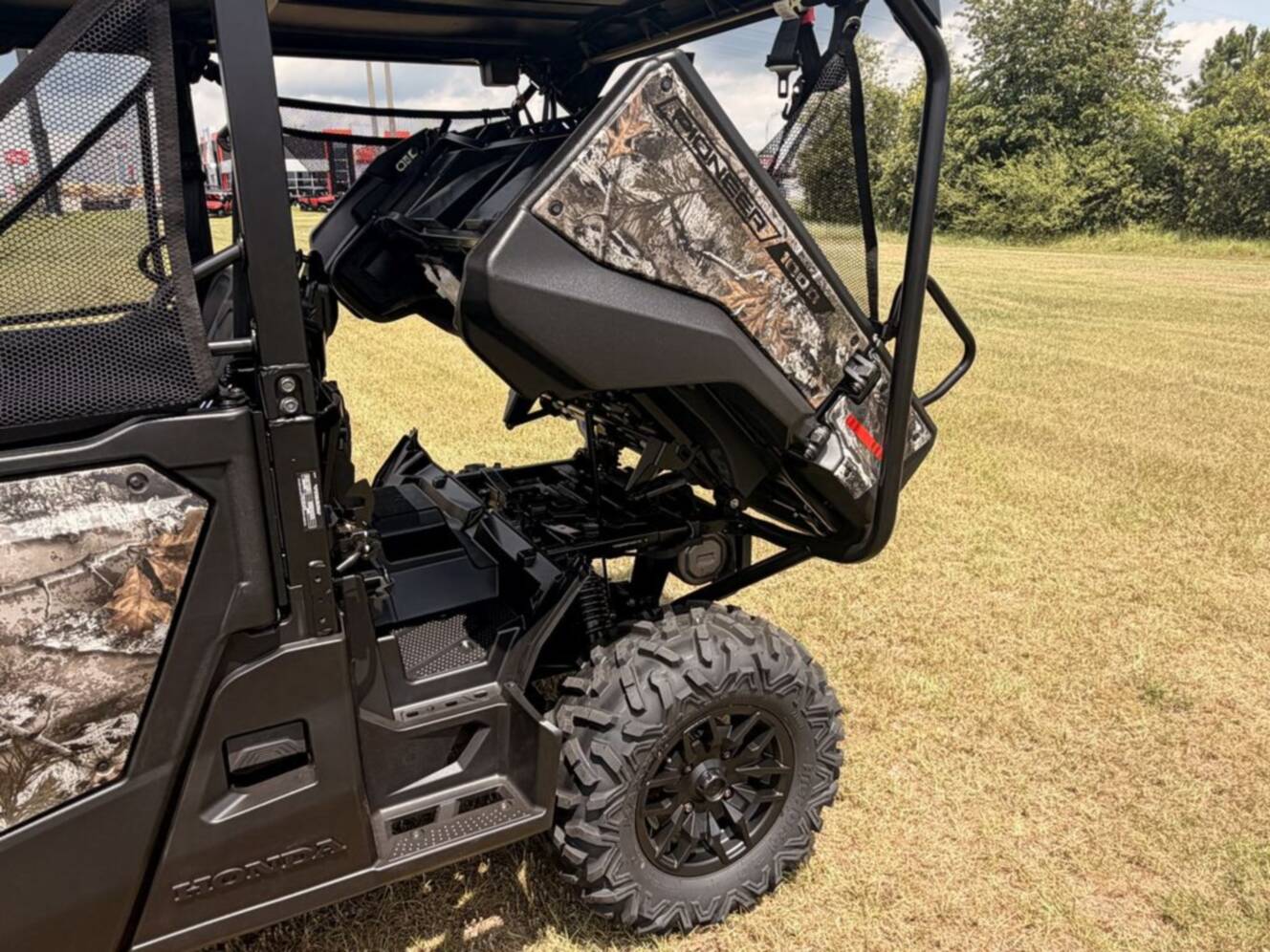 A photo of this 2026 Honda® Pioneer 1000-5 Deluxe TrueTimber Atera Camo