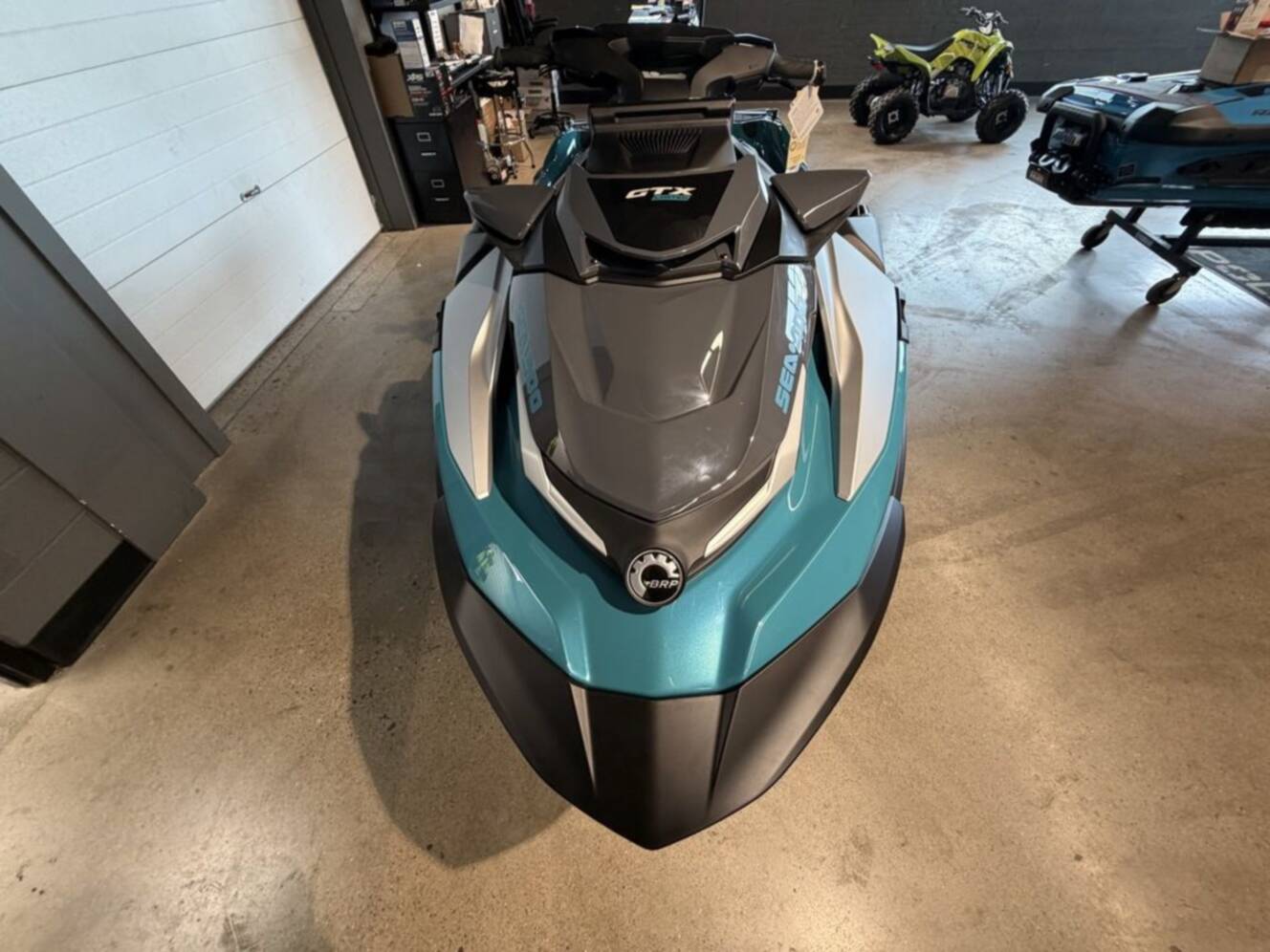 A photo of this 2026 Sea-Doo GTX Limited 325 Teal Metallic