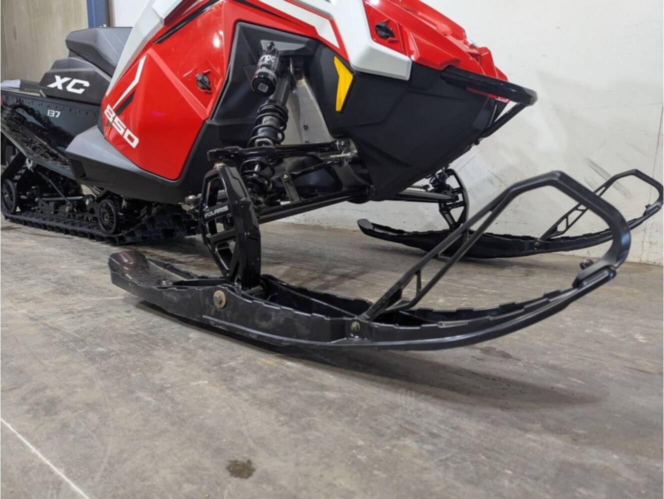 A photo of this 2027 Polaris® 850 INDY XC 137 Indy Red / White Lightning / Gloss Blac