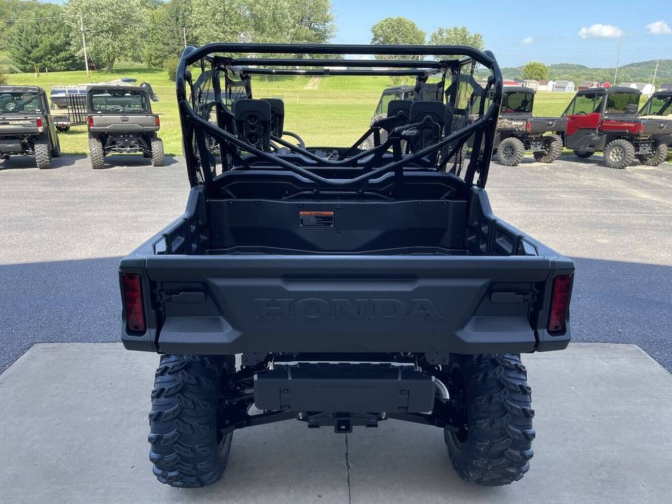 A photo of this 2025 Honda® Pioneer 1000-6 Deluxe Crew TrueTimber Atera Camo