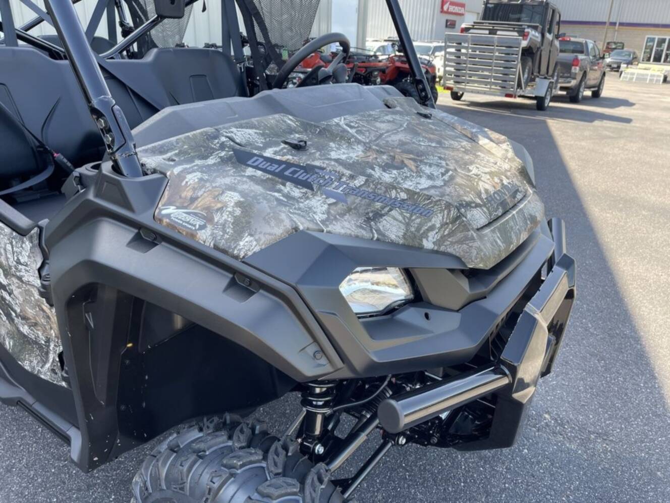 A photo of this 2025 Honda® Pioneer 1000-6 Deluxe Crew TrueTimber Atera Camo