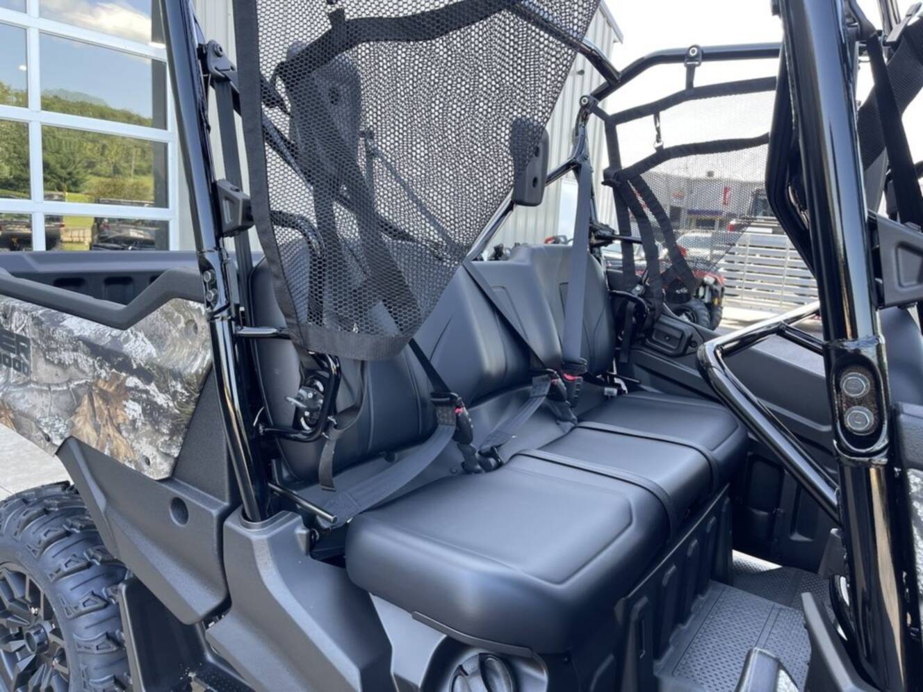 A photo of this 2025 Honda® Pioneer 1000-6 Deluxe Crew TrueTimber Atera Camo
