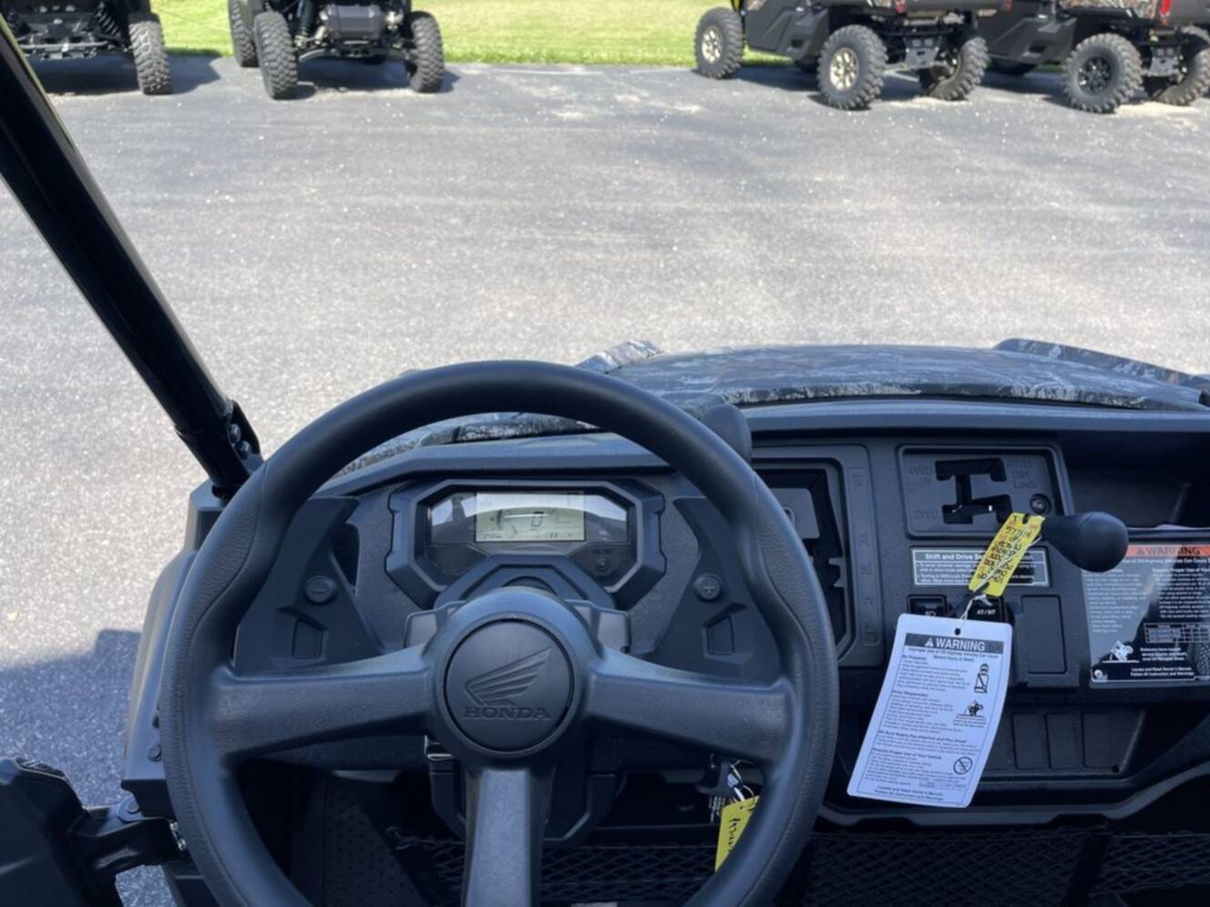 A photo of this 2025 Honda® Pioneer 1000-6 Deluxe Crew TrueTimber Atera Camo