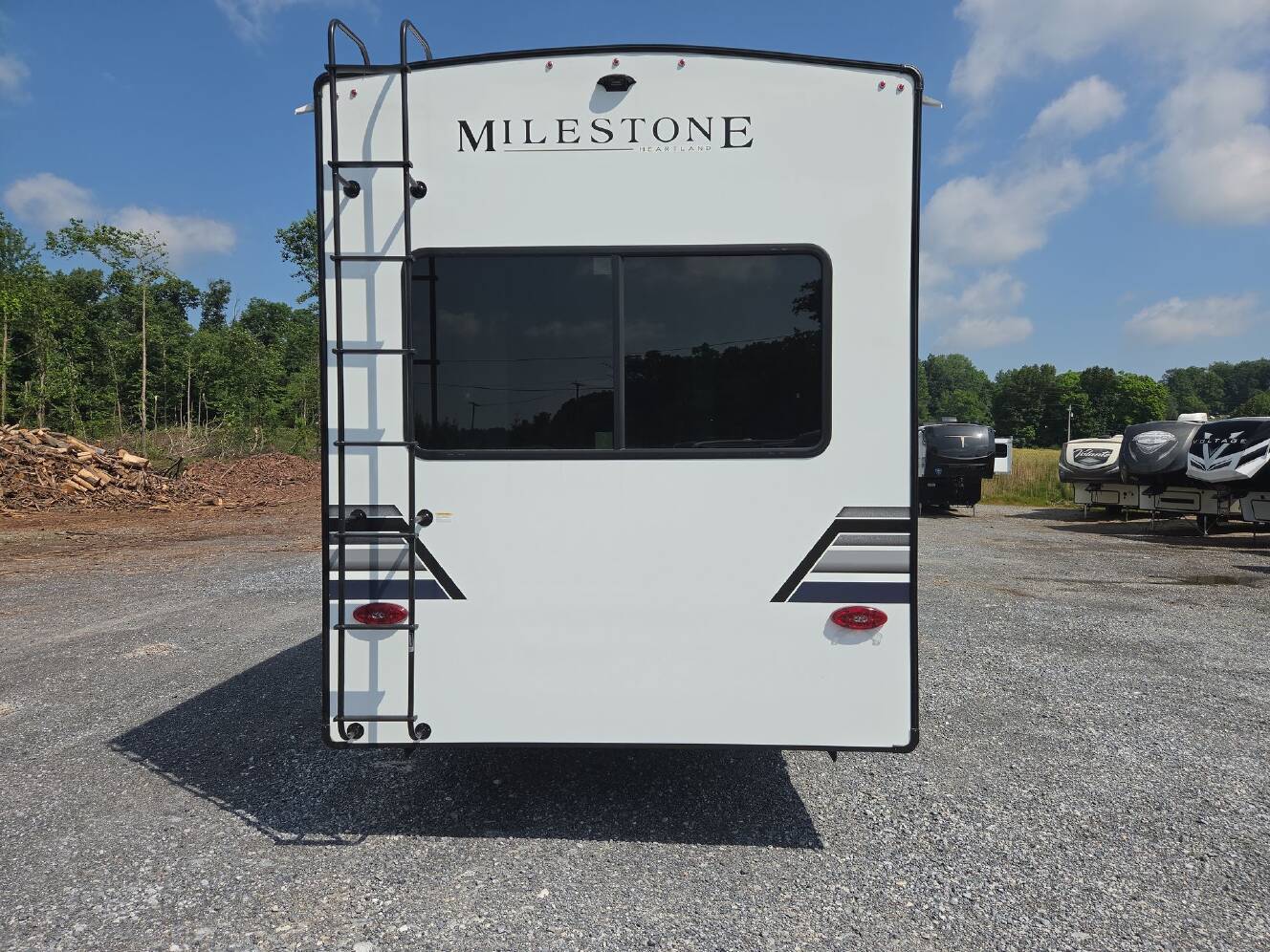 A photo of this 2027 Heartland Milestone 31RL