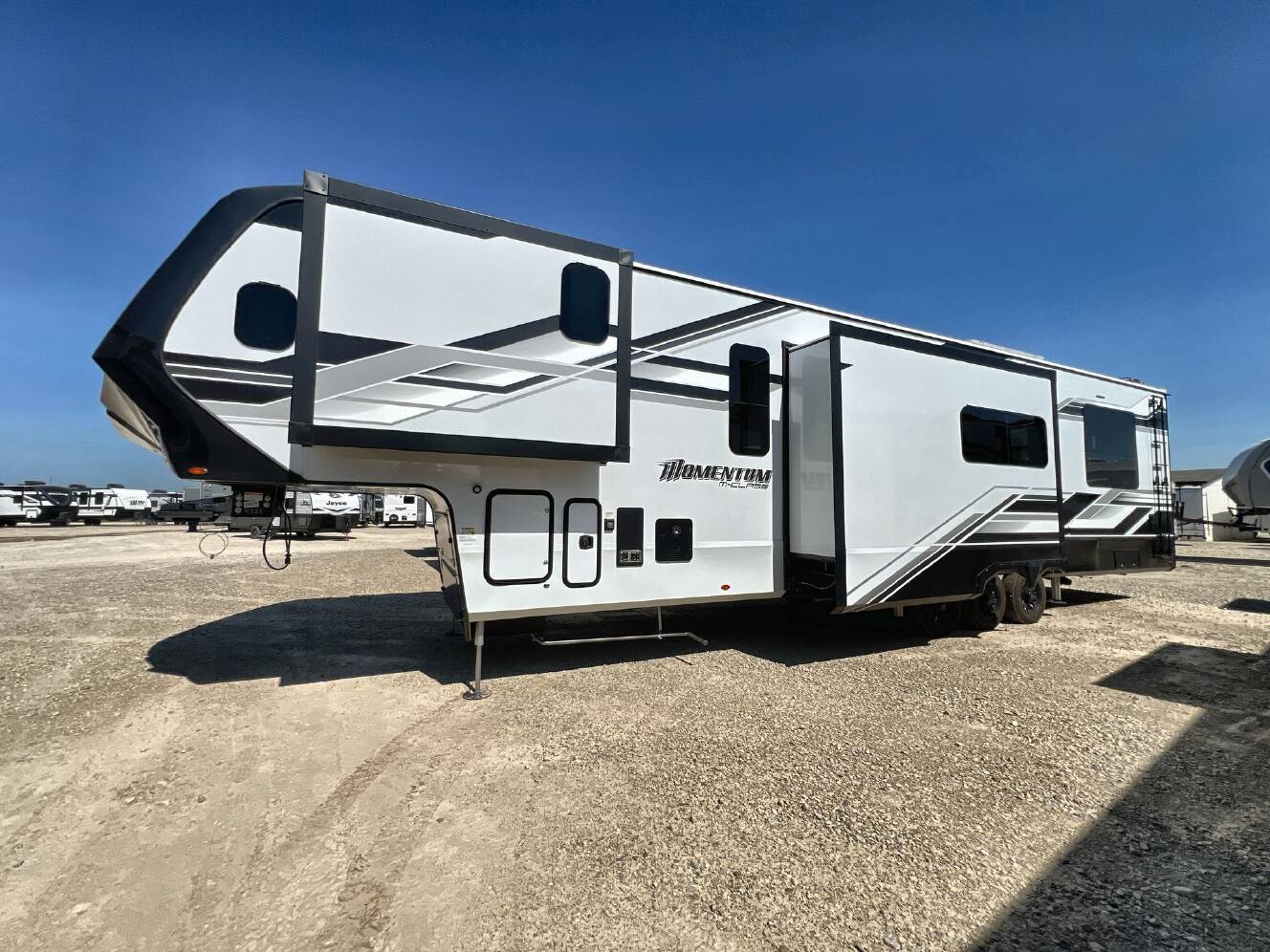 A photo of this 2026 Grand Design MOMENTUM 395MS