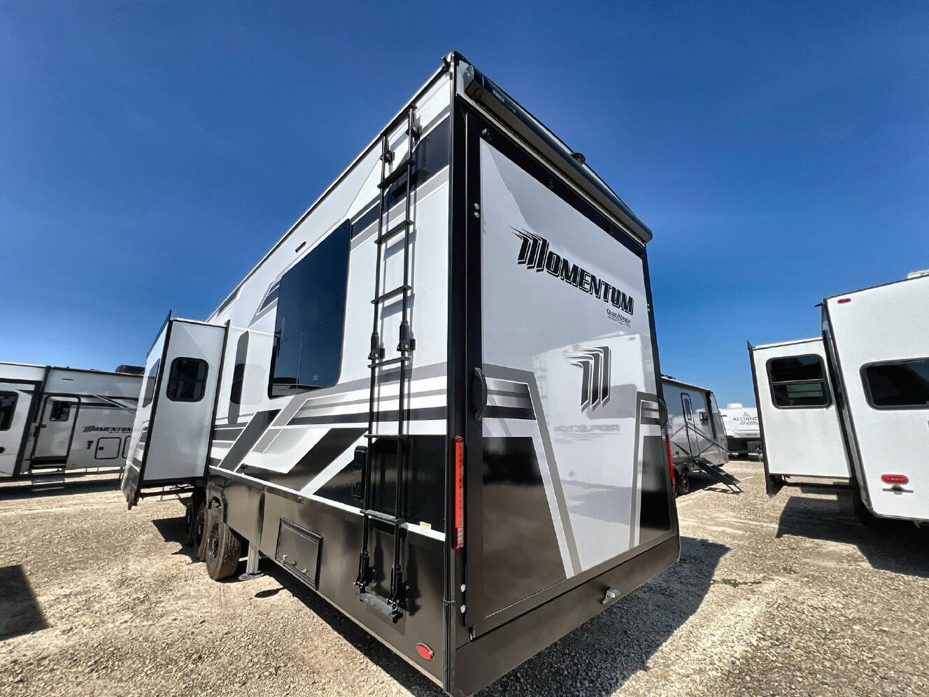 A photo of this 2026 Grand Design MOMENTUM 395MS