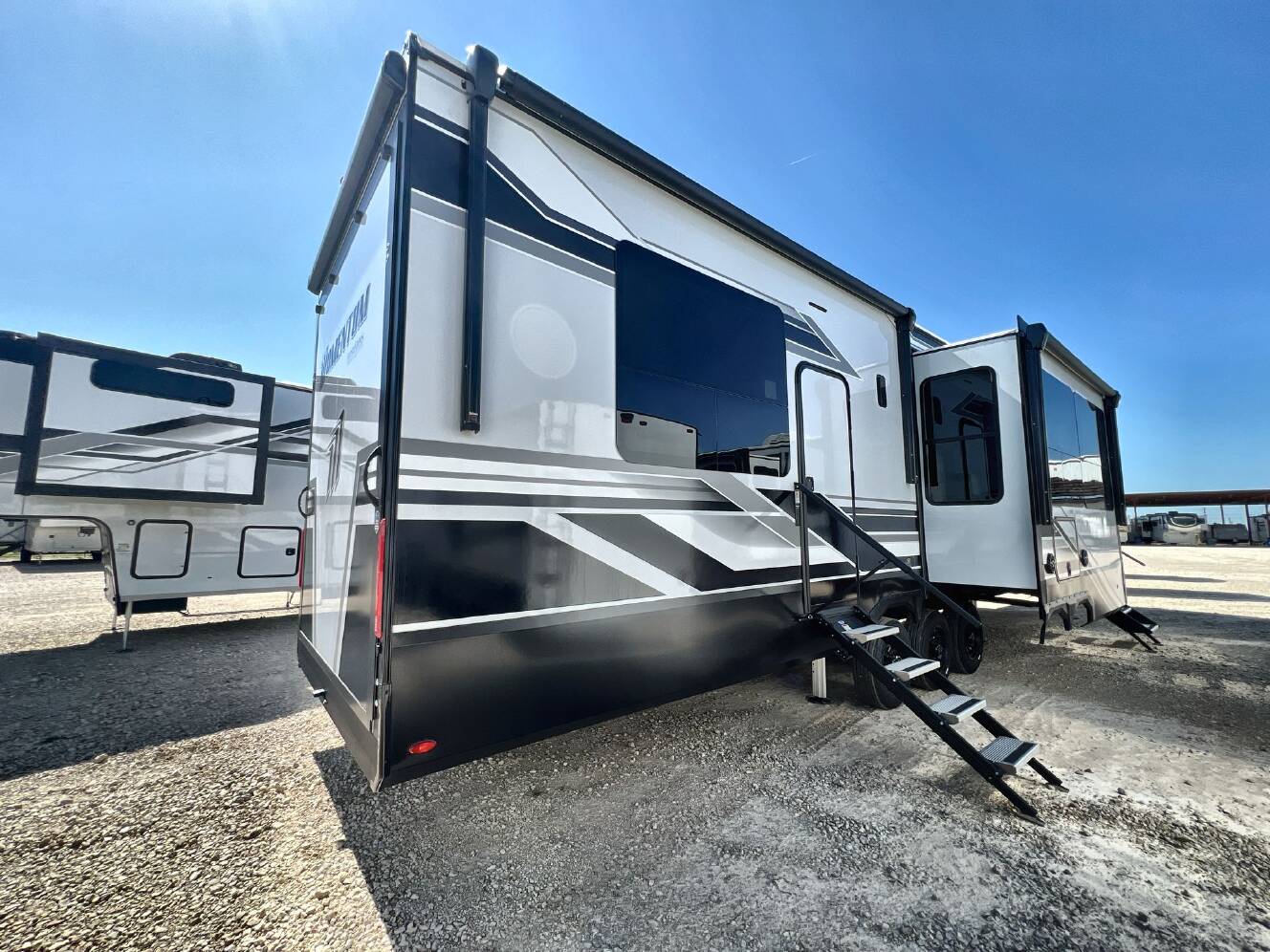 A photo of this 2026 Grand Design MOMENTUM 395MS