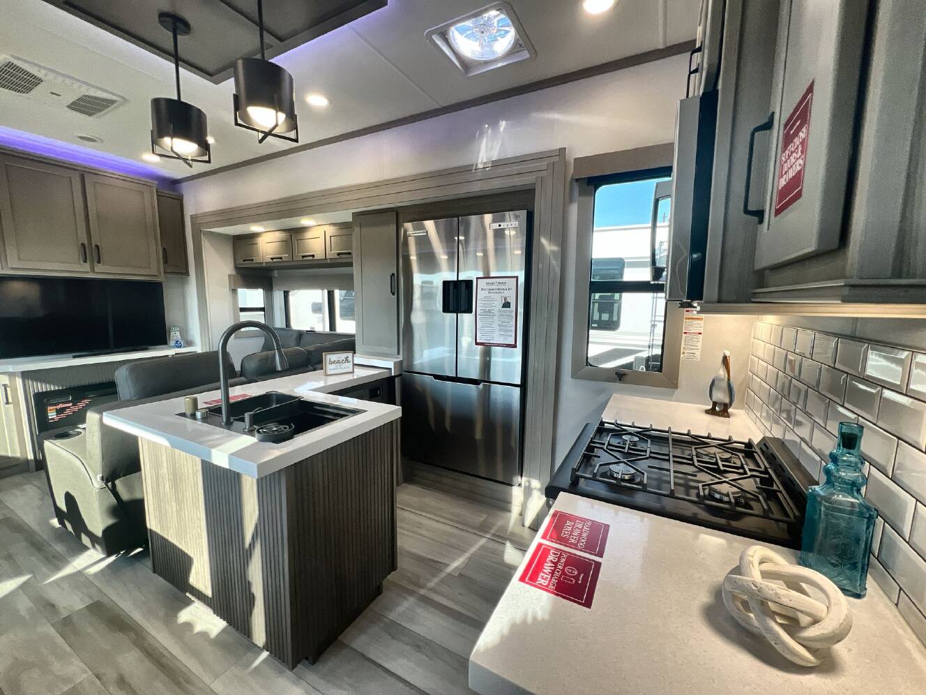 A photo of this 2026 Grand Design MOMENTUM 395MS