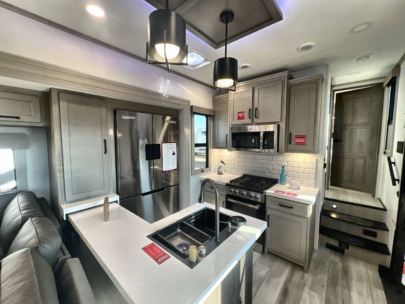 A photo of this 2026 Grand Design MOMENTUM 395MS