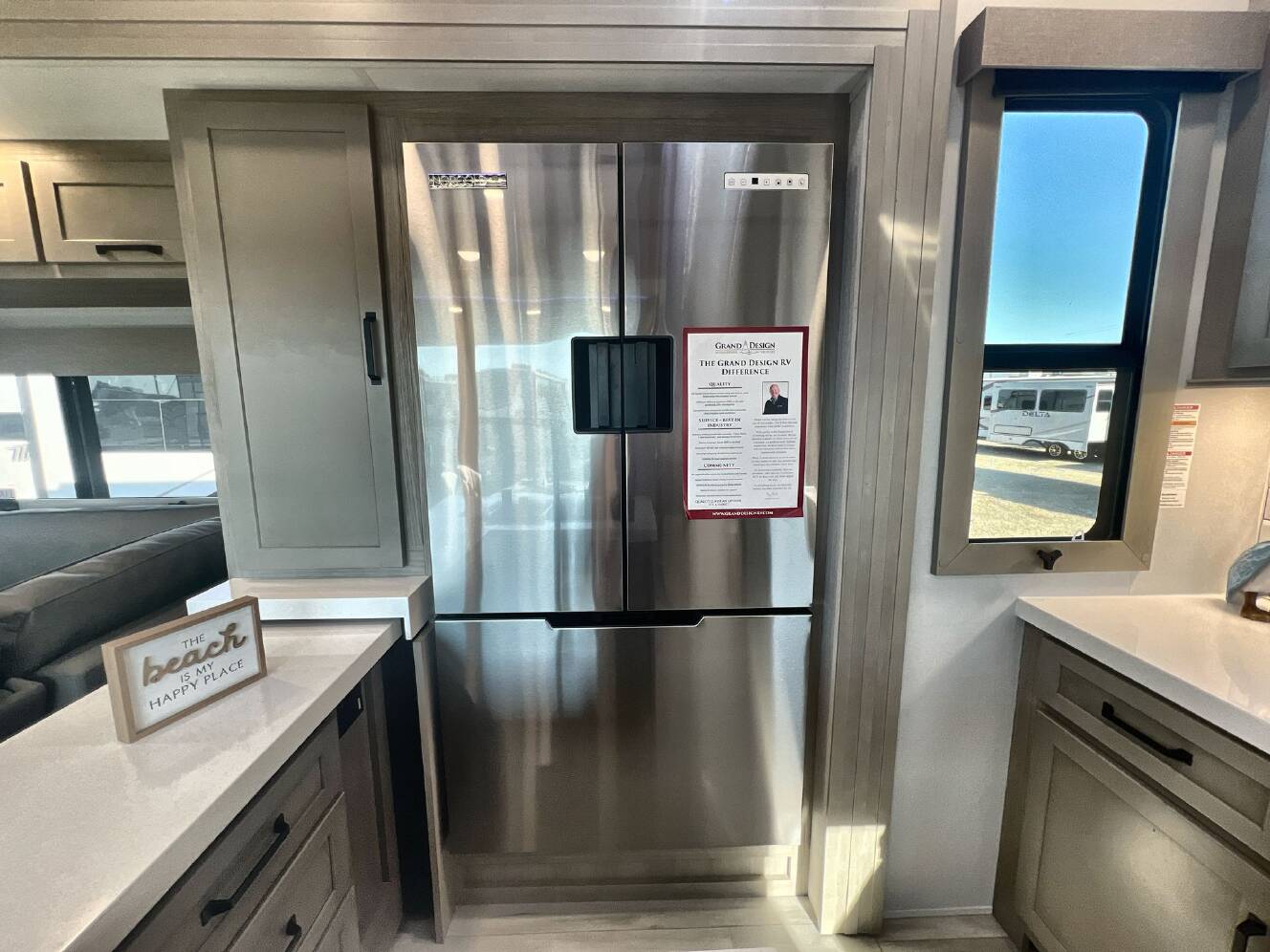 A photo of this 2026 Grand Design MOMENTUM 395MS