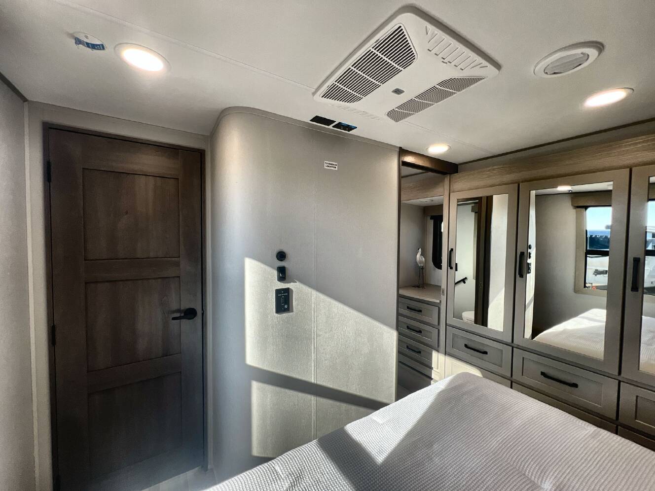 A photo of this 2026 Grand Design MOMENTUM 395MS