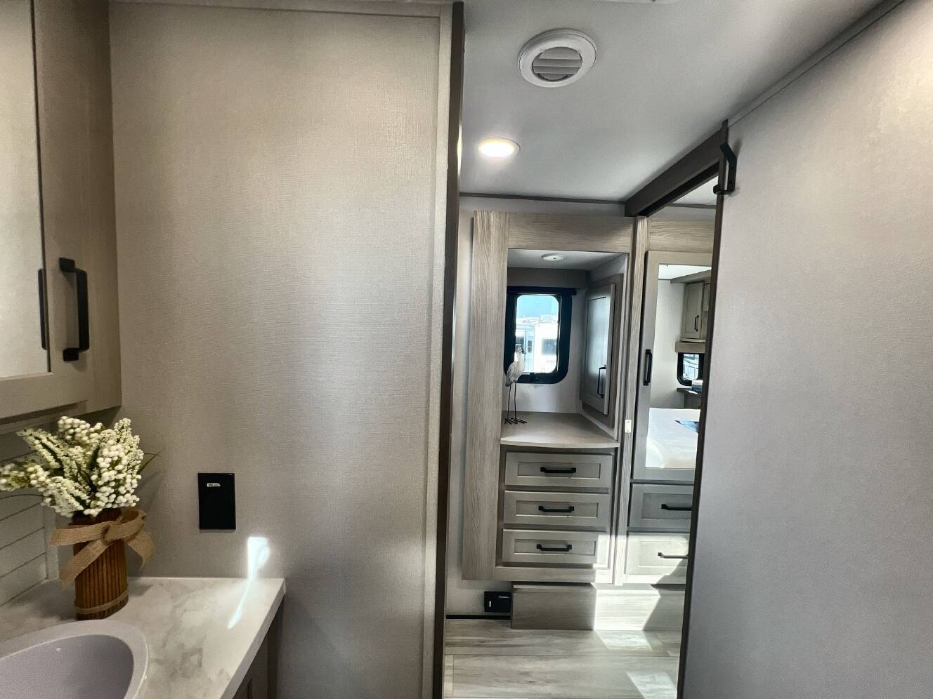 A photo of this 2026 Grand Design MOMENTUM 395MS