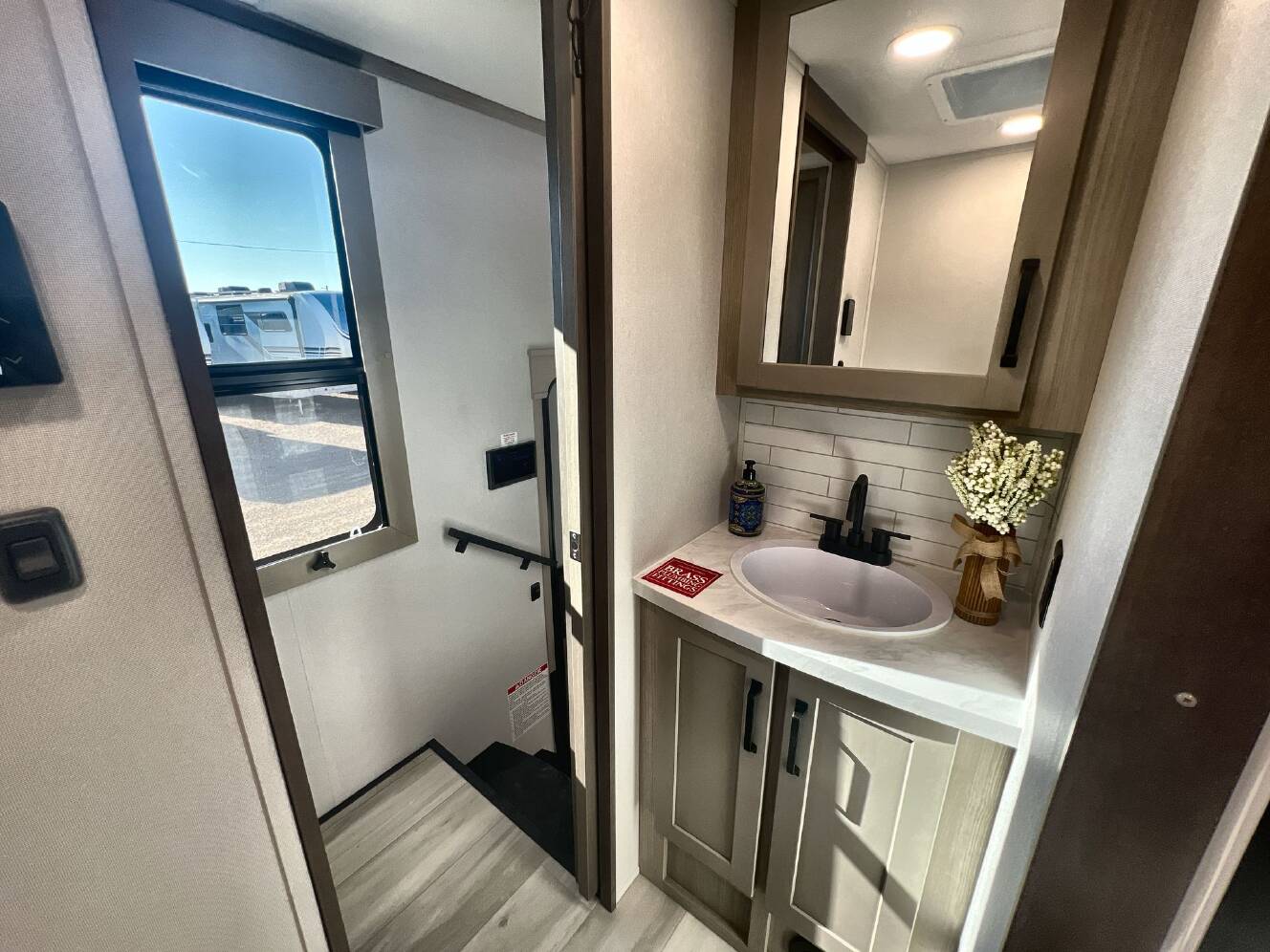 A photo of this 2026 Grand Design MOMENTUM 395MS