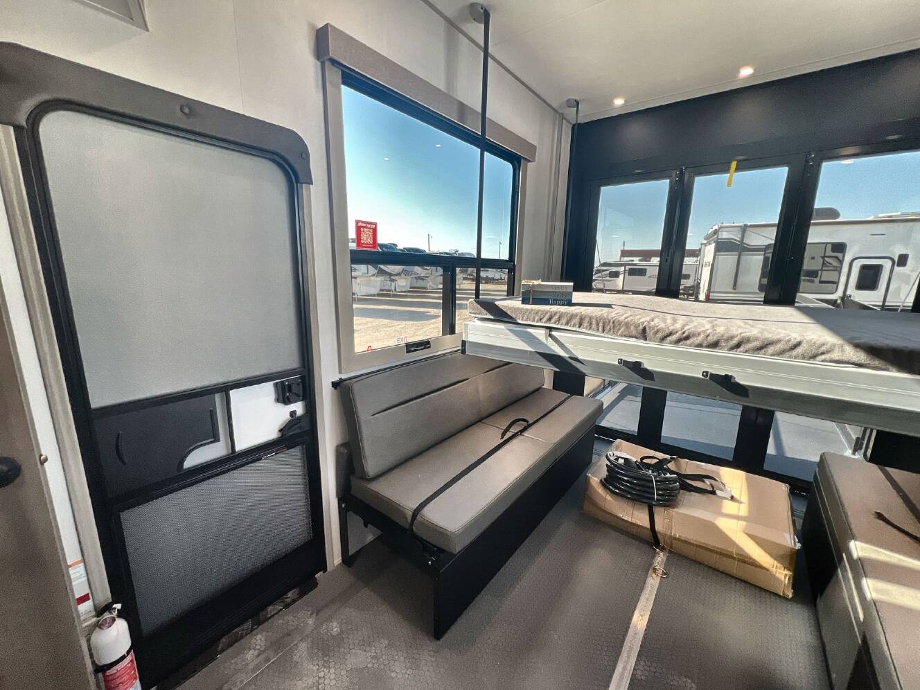 A photo of this 2026 Grand Design MOMENTUM 395MS