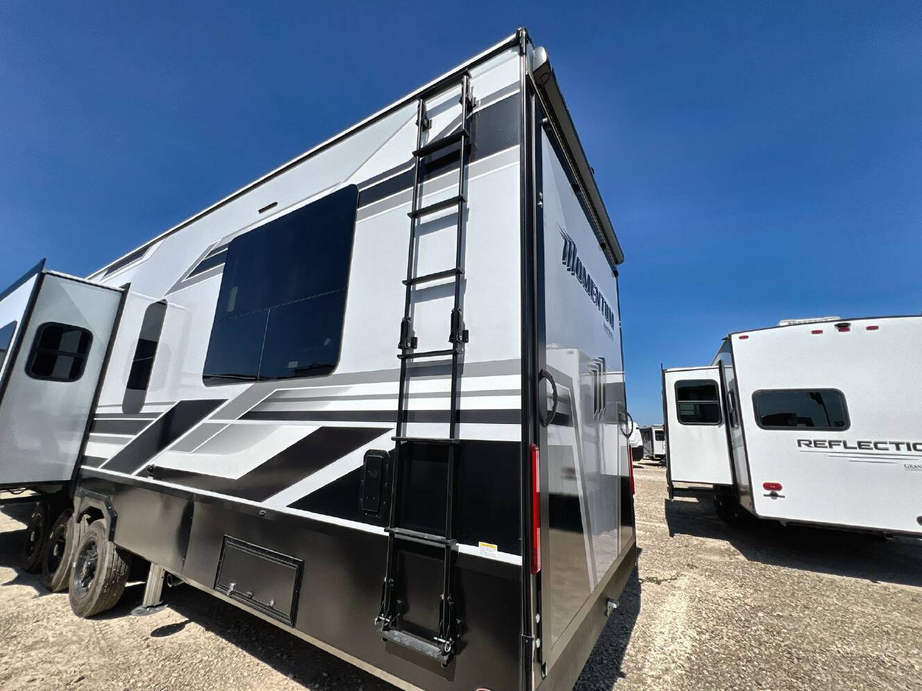 A photo of this 2026 Grand Design MOMENTUM 395MS