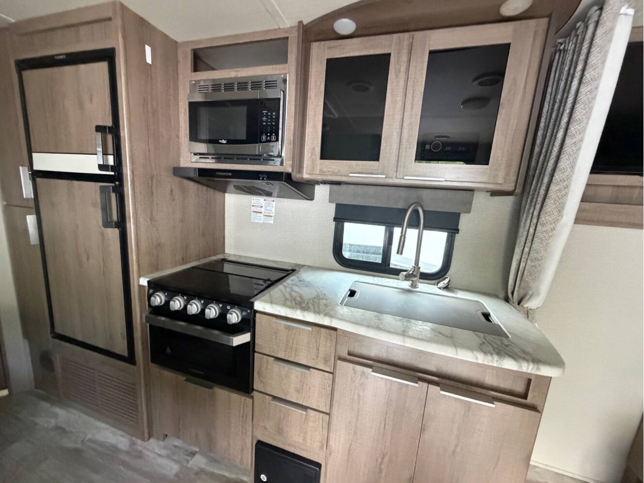 A photo of this 2020 Grand Design IMAGINE XLS 21BHE