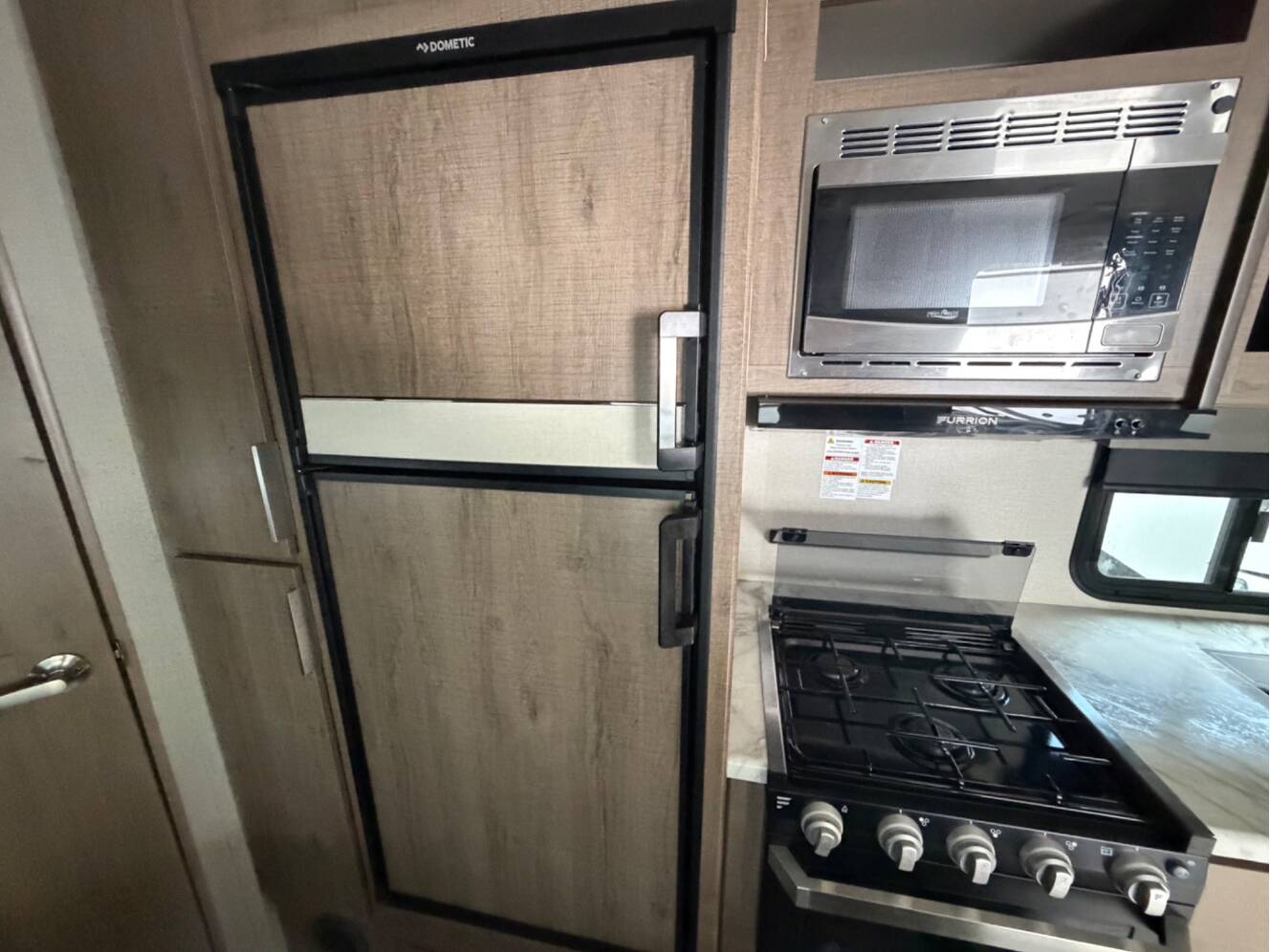 A photo of this 2020 Grand Design IMAGINE XLS 21BHE