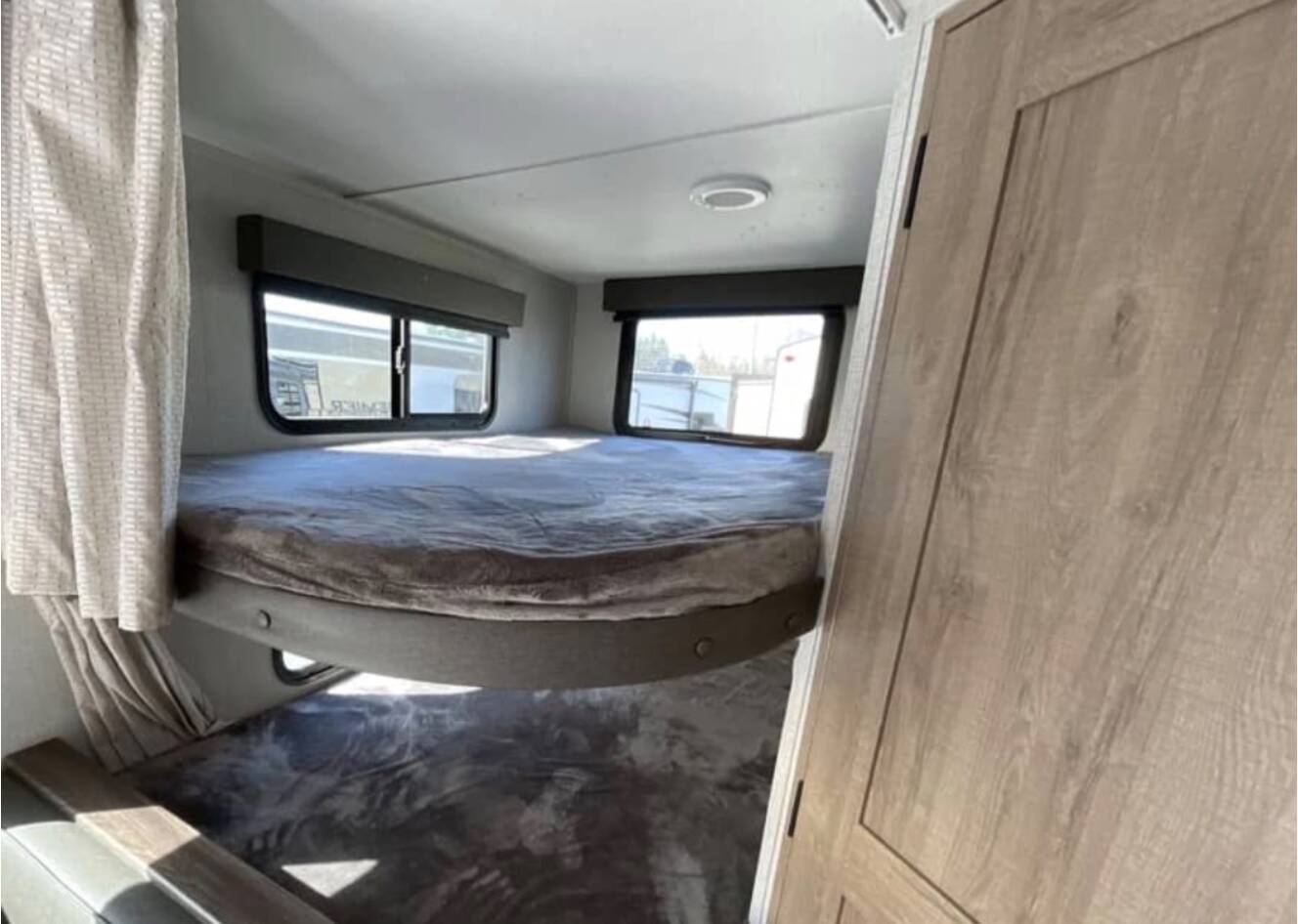 A photo of this 2020 Grand Design IMAGINE XLS 21BHE
